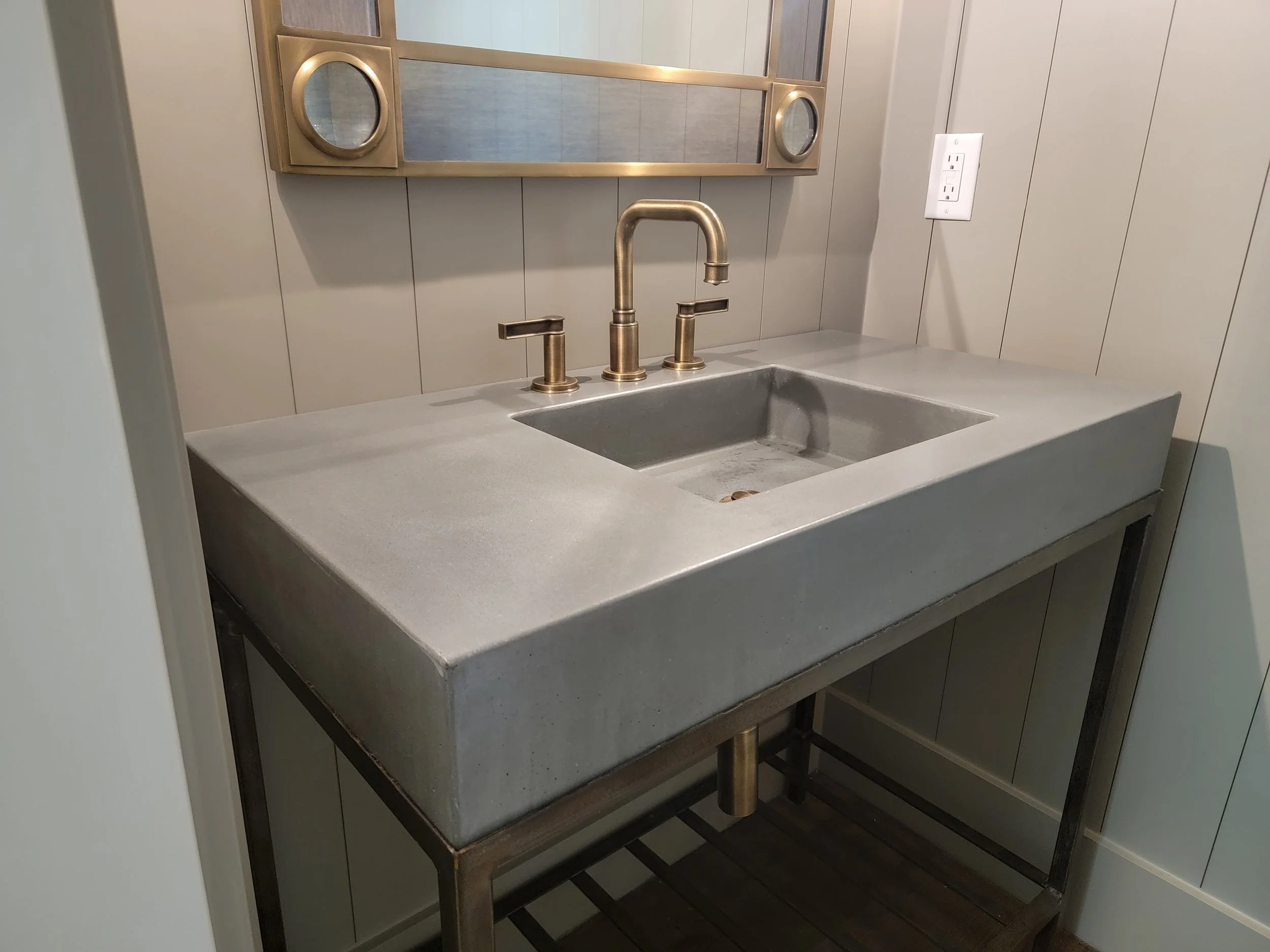 Palmetto Block concrete sink on a metal vanity base