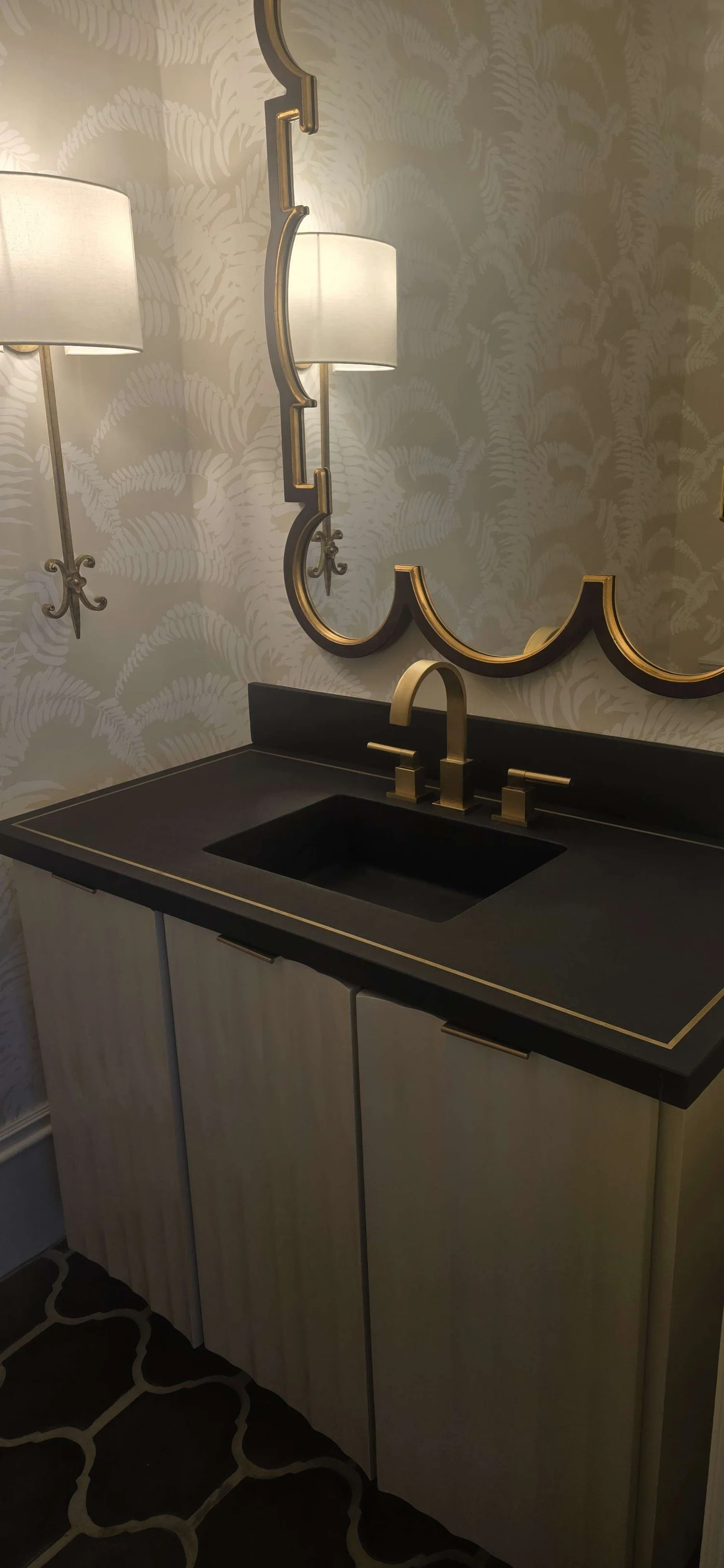 Charcoal integral vanity with flush brass inlay border
