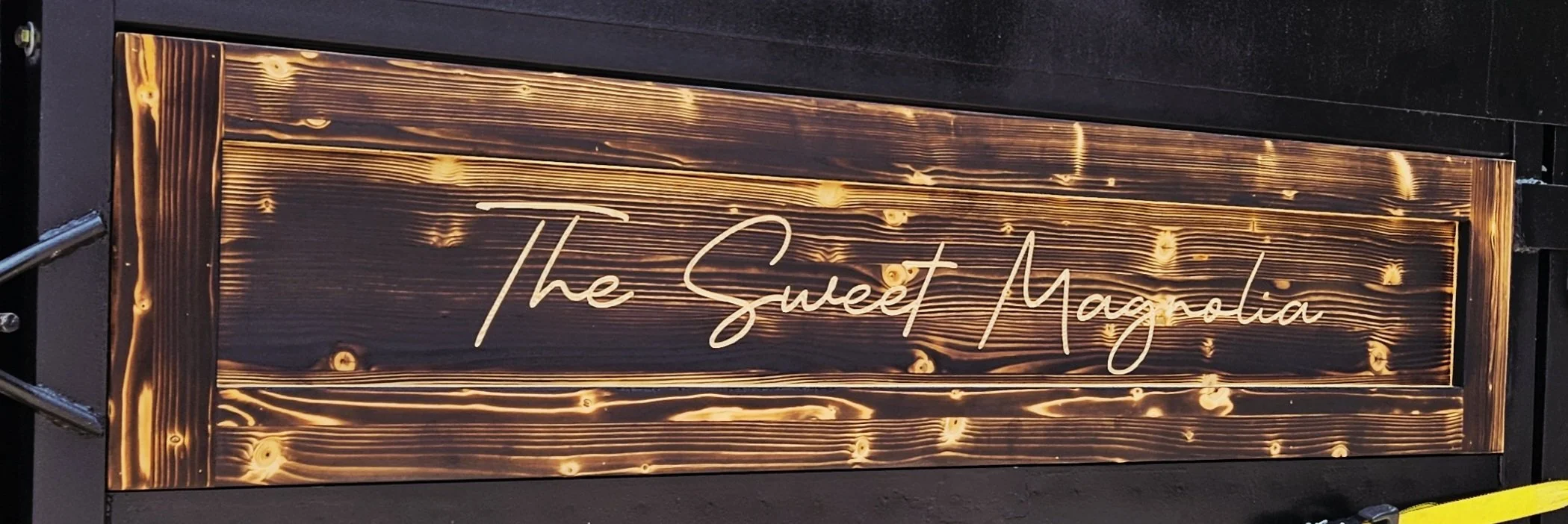 custom signage, carved