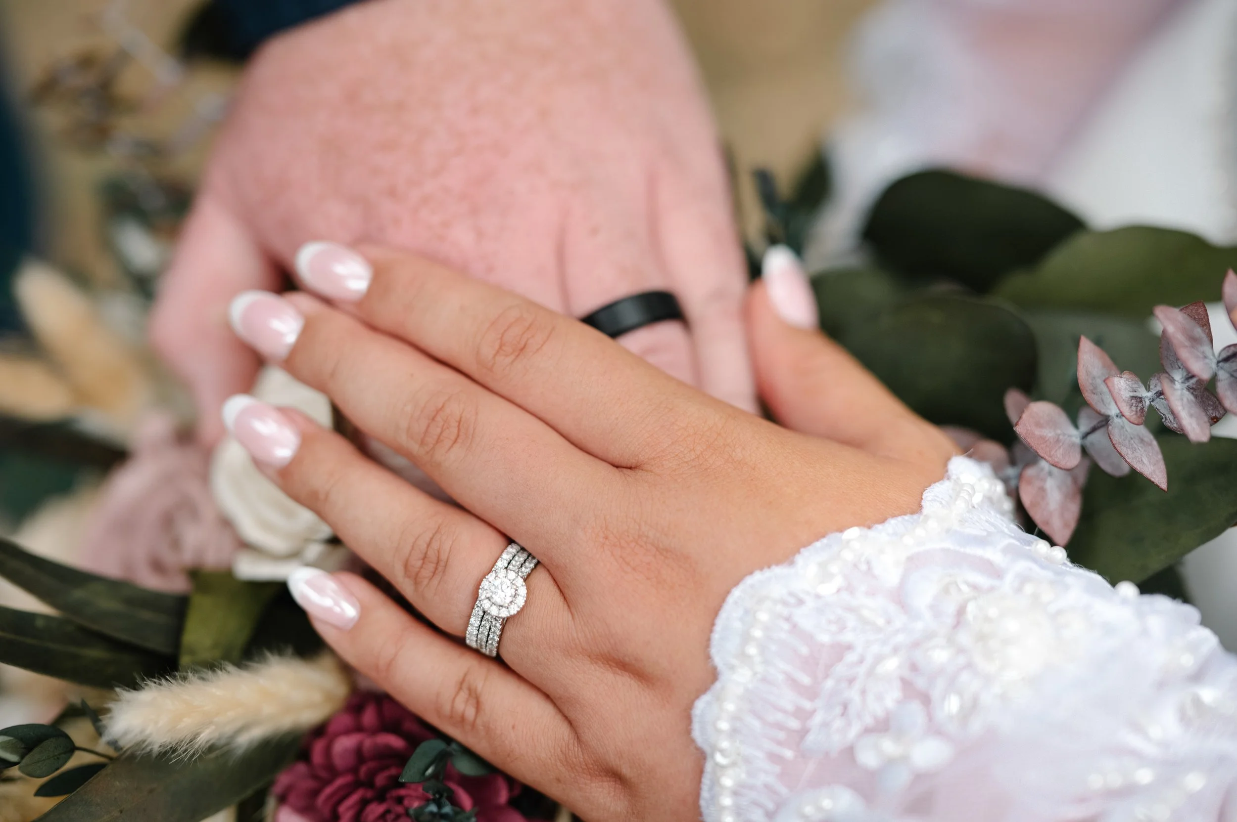 Couple meeting with a DJ to discuss service packages and pricing in Kentucky