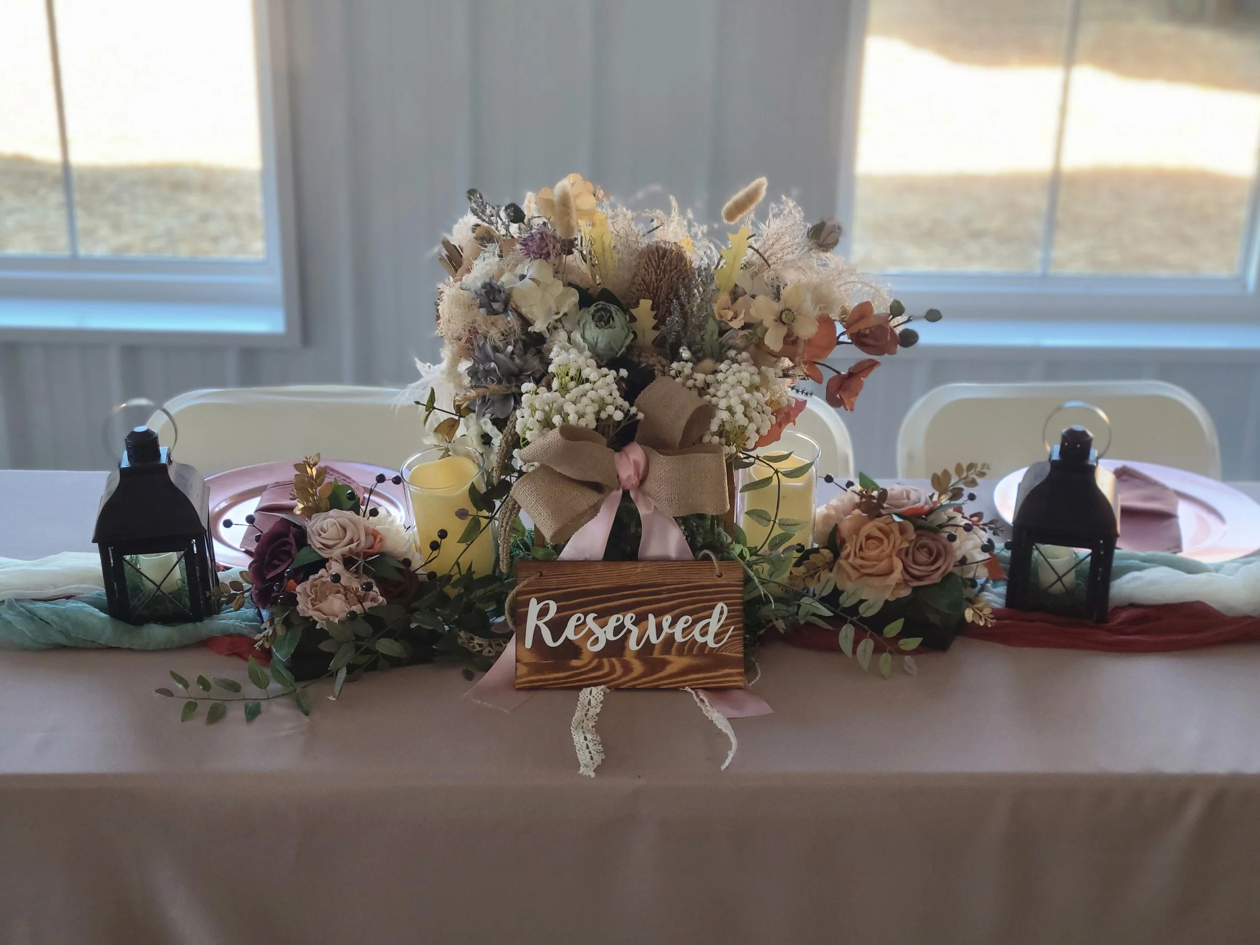 Wedding reception setup with tables and dance floor at Hilton Farms near Owensboro KY