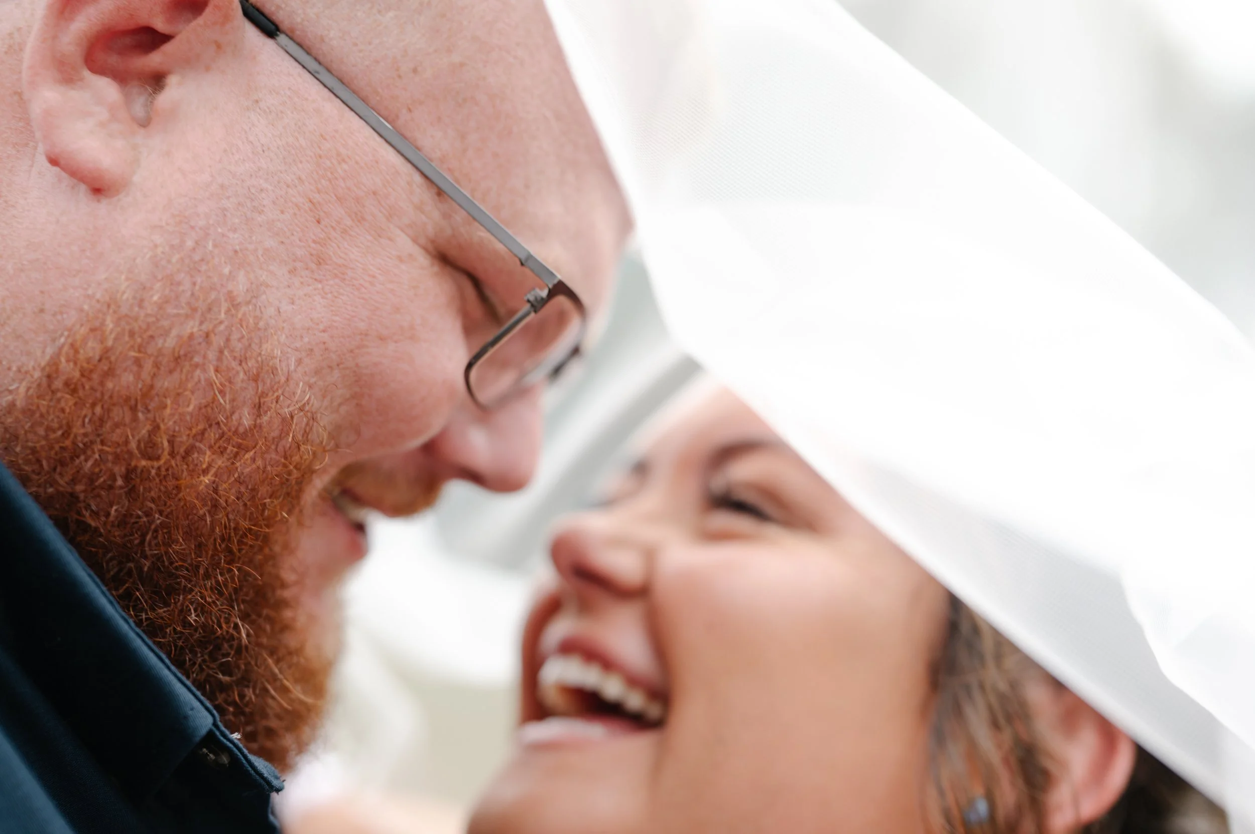 Professional wedding makeup artist working on bride at Hilton Farms wedding venue