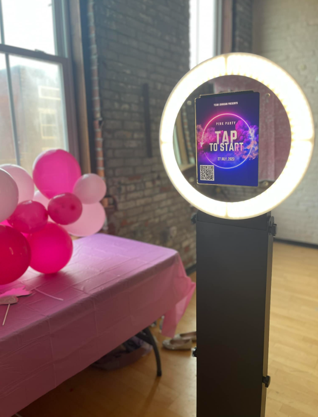 Friends taking candid photo booth pictures at an Owensboro Kentucky wedding