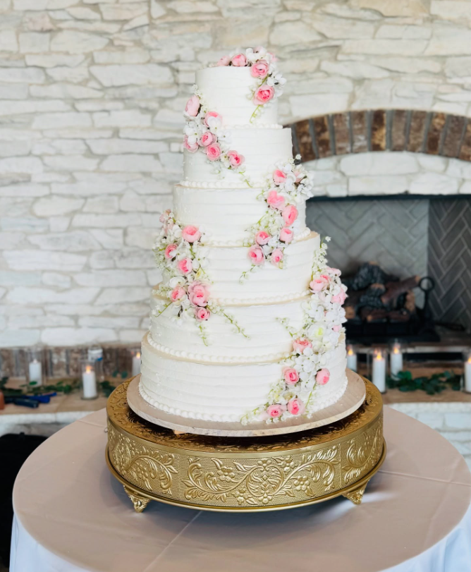 Wedding cake designer preparing tiers for a large Kentucky wedding