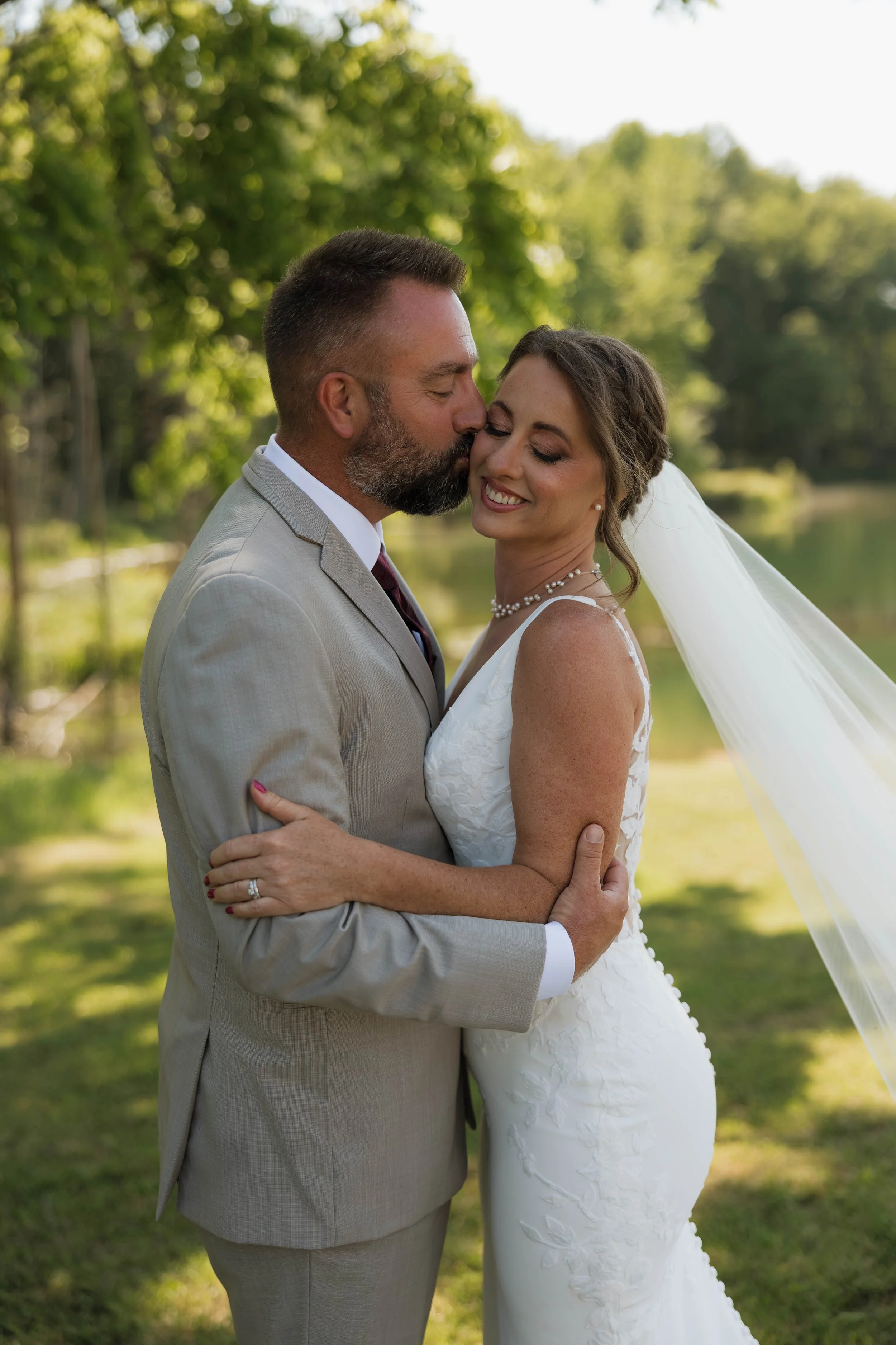 Outdoor wedding photo opportunities with scenic lake views at Hilton Farms LLC near Bowling Green, Nashville, Evansville, and Owensboro.