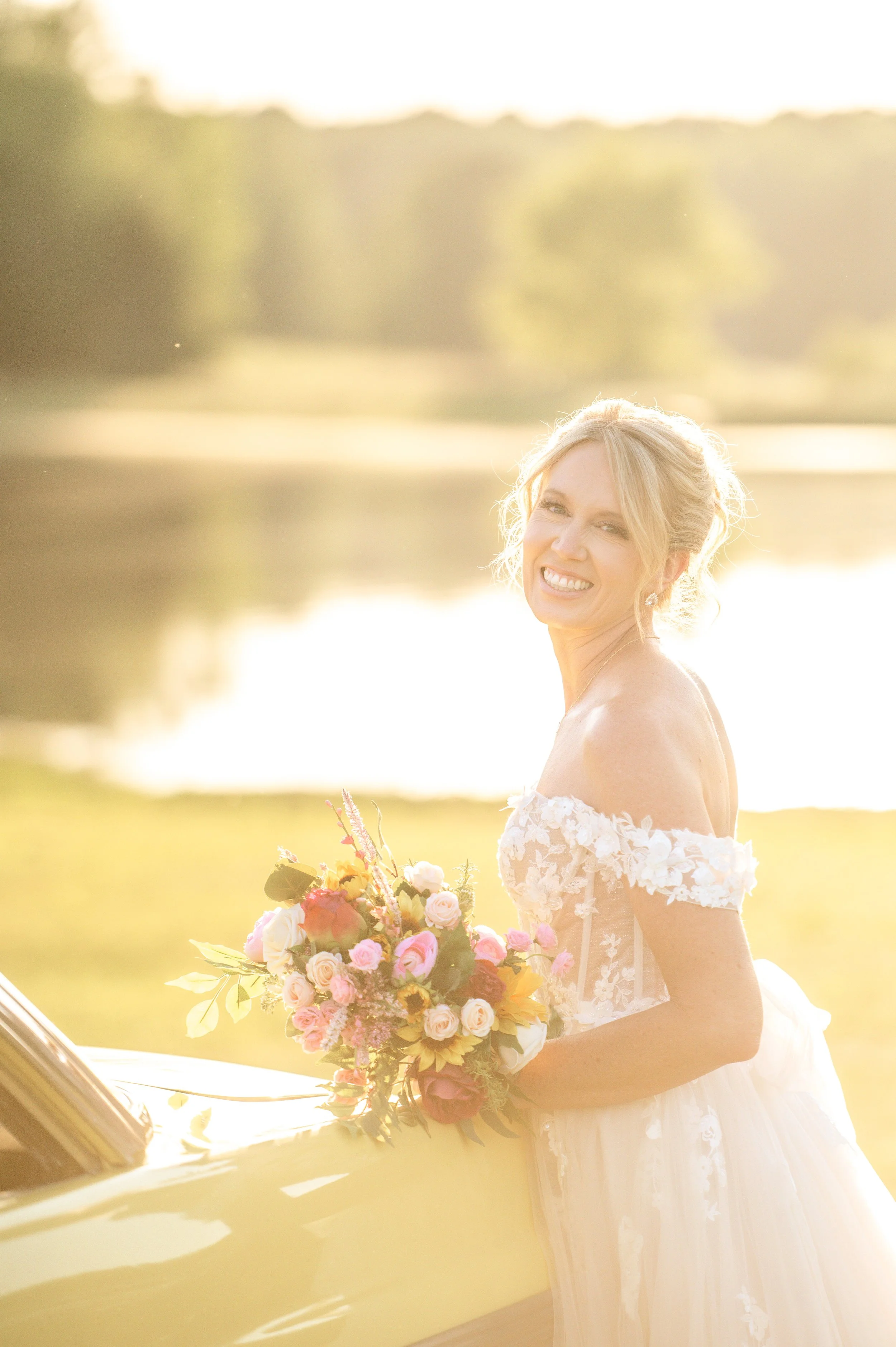 Scenic lake and rolling hills surrounding Hilton Farms wedding venue in Kentucky