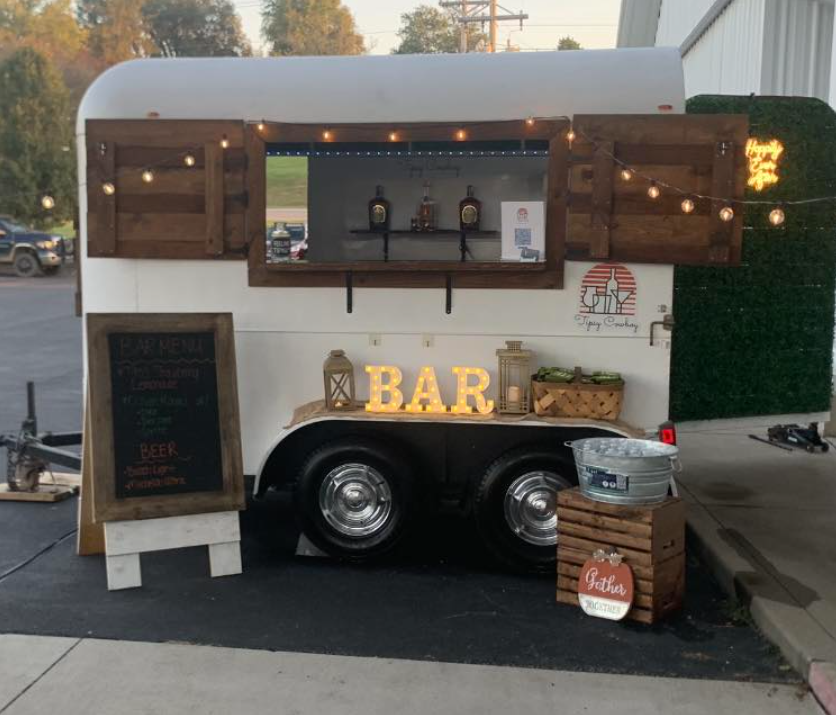 Mobile bar trailer serving guests at Hilton Farms LLC