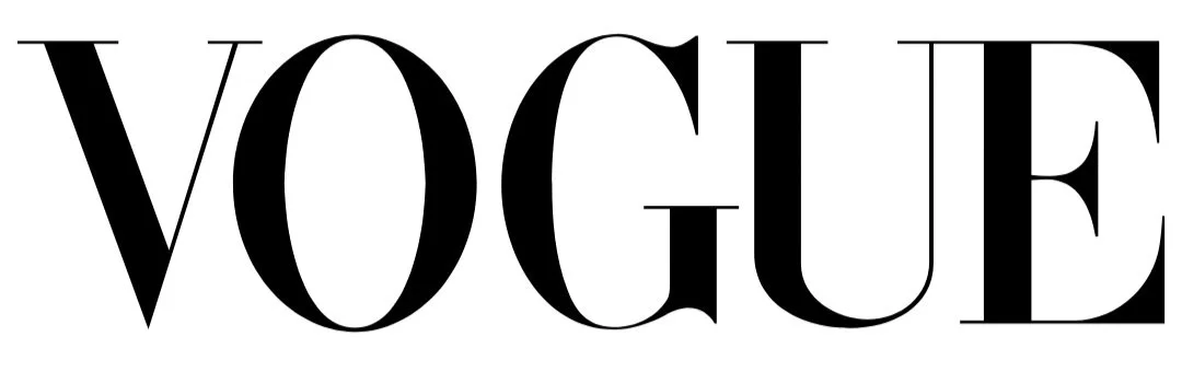 Vogue magazine logo in large black serif letters on a white background.