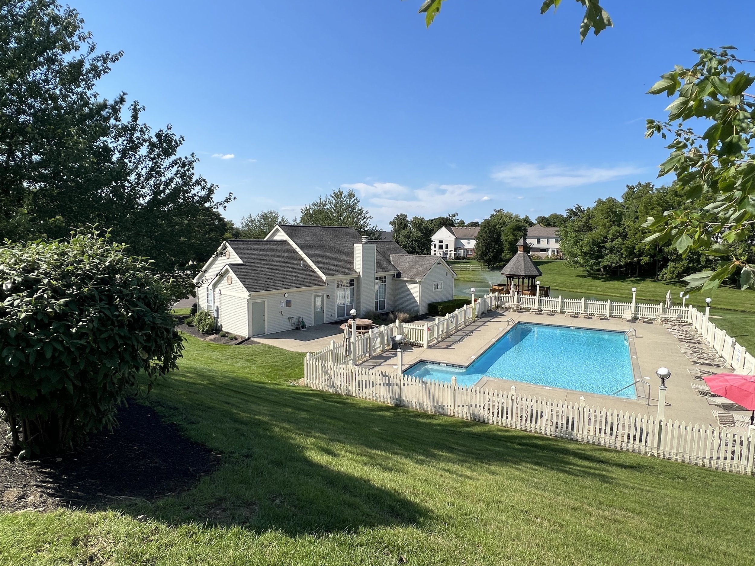 Condominium clubhouse with newly installed asphalt shingle roof