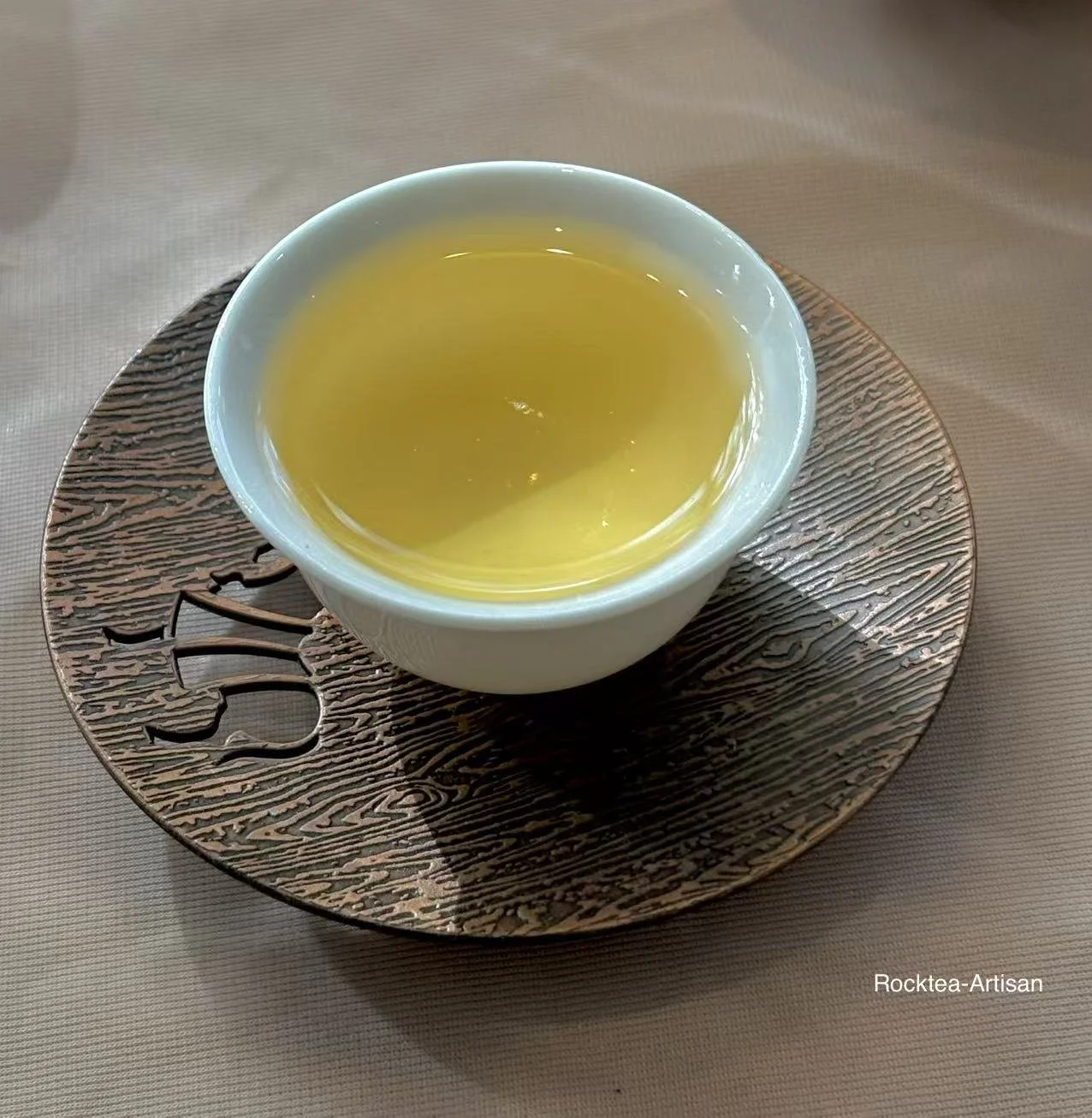 Goldgen honeydew oolong liquid, clear and light in color