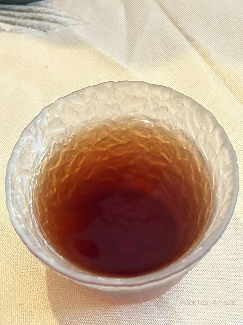 Clear amber herbal tea with a naturally sweet aroma
