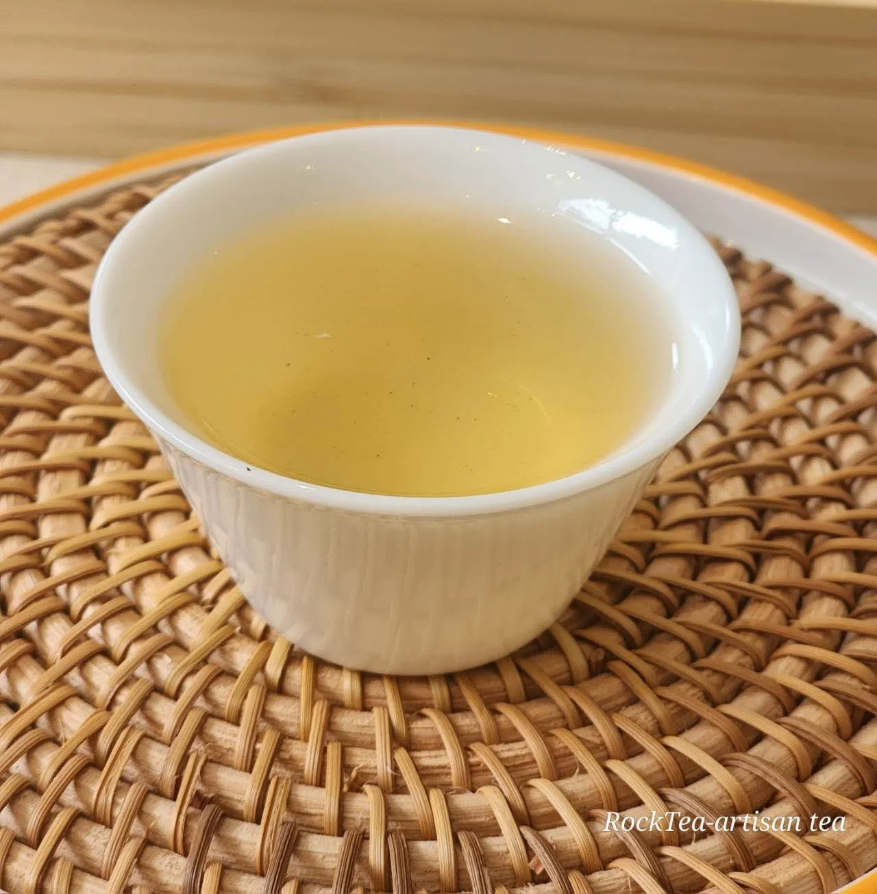 Crystal-clear fresh Tieguanyin oolong tea soup, offering a light, non-heavy delicate taste perfectly suited for those preferring a smooth, clean flavor.
