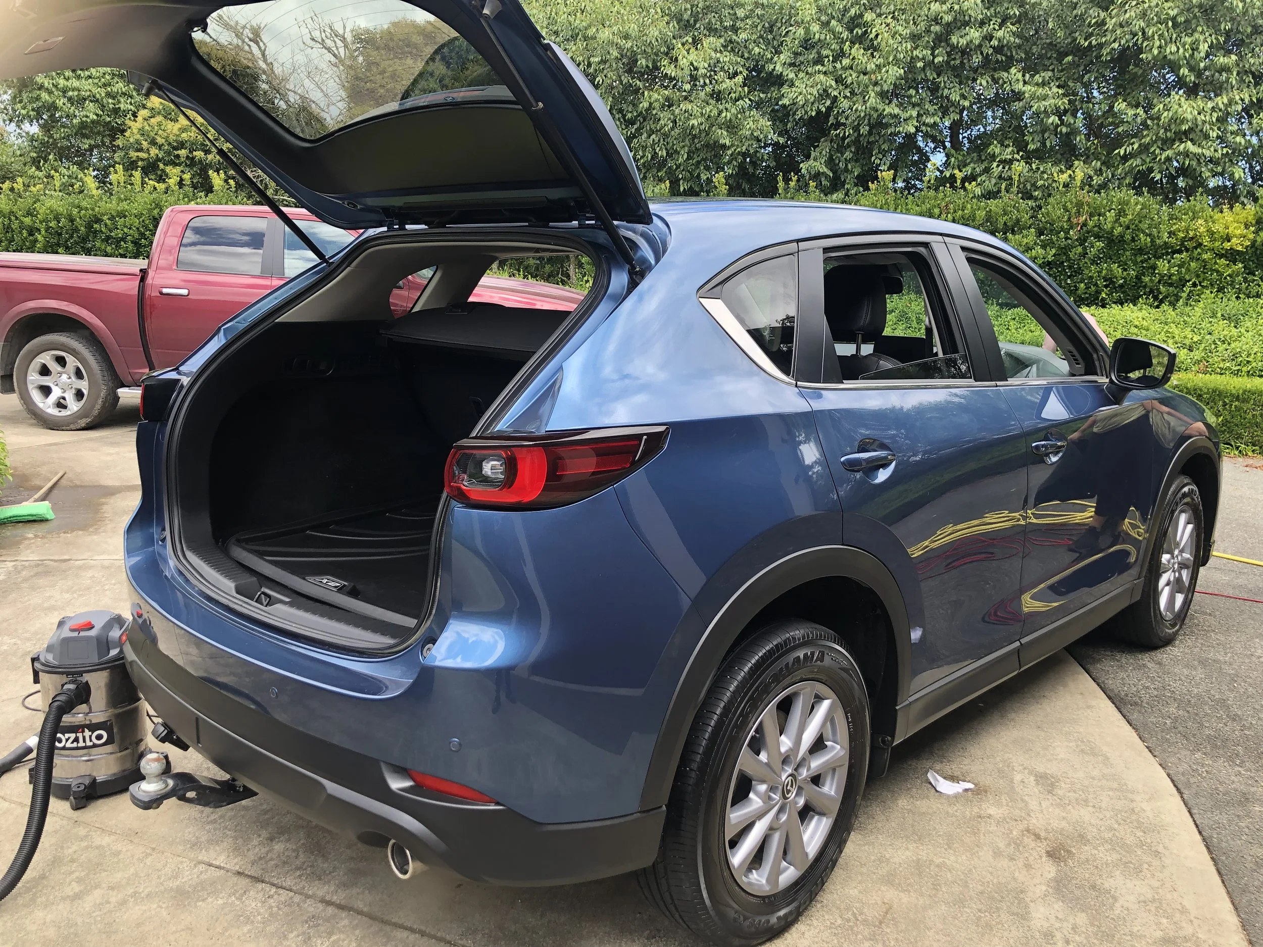 Car bodywork clean and reflective after premium exterior valet.