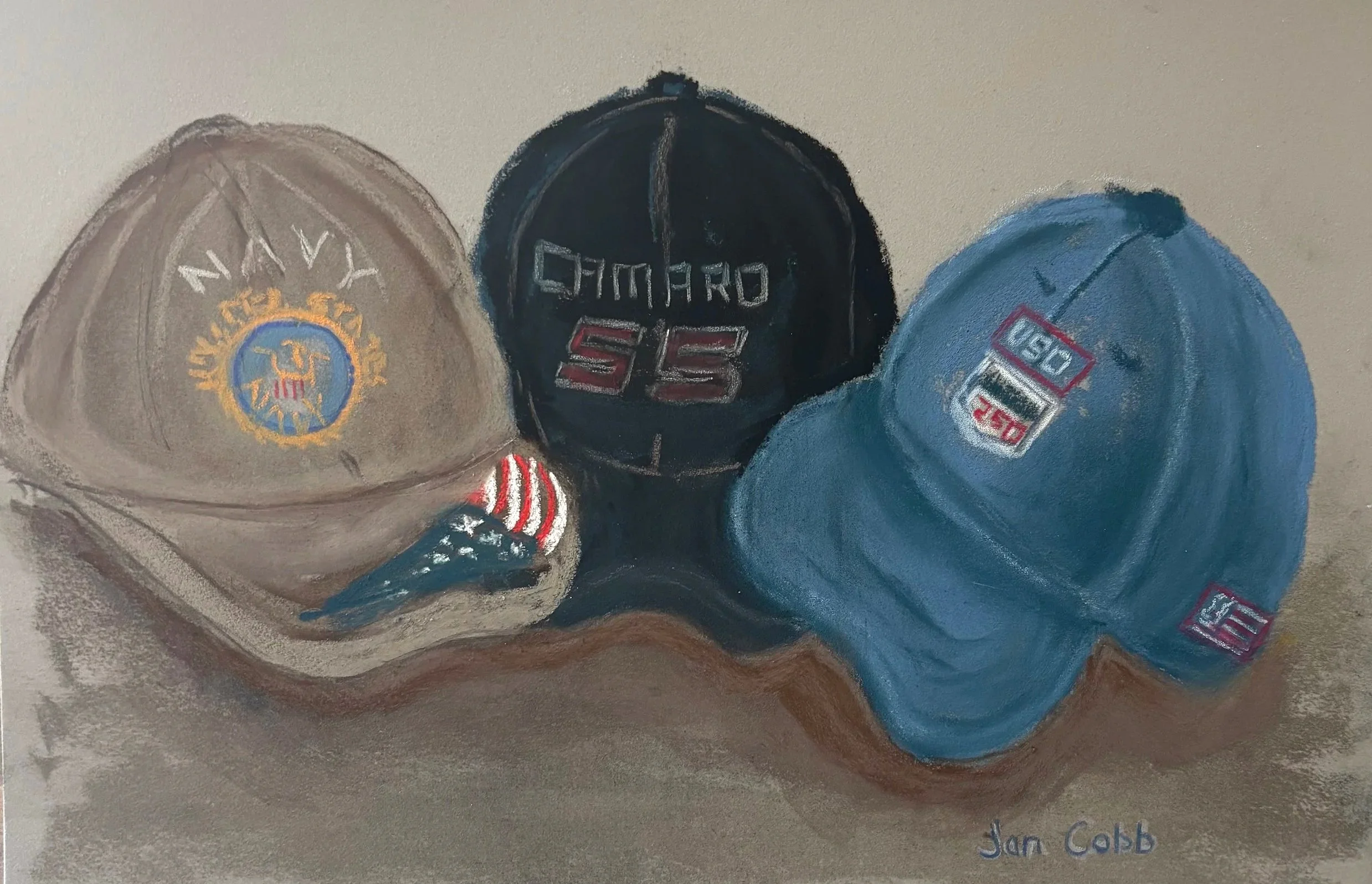 JAN COBB ~  Tom’s Many Hats!, 9 x 12", soft pastels on Canson Mi-Teintes Velvet - "Hats to my husband, Tom, means baseball caps! Dozens of them over the years. US Navy, Corvettes - 94, 2004, 2013, Comaro SS. Then from places we have lived and travele