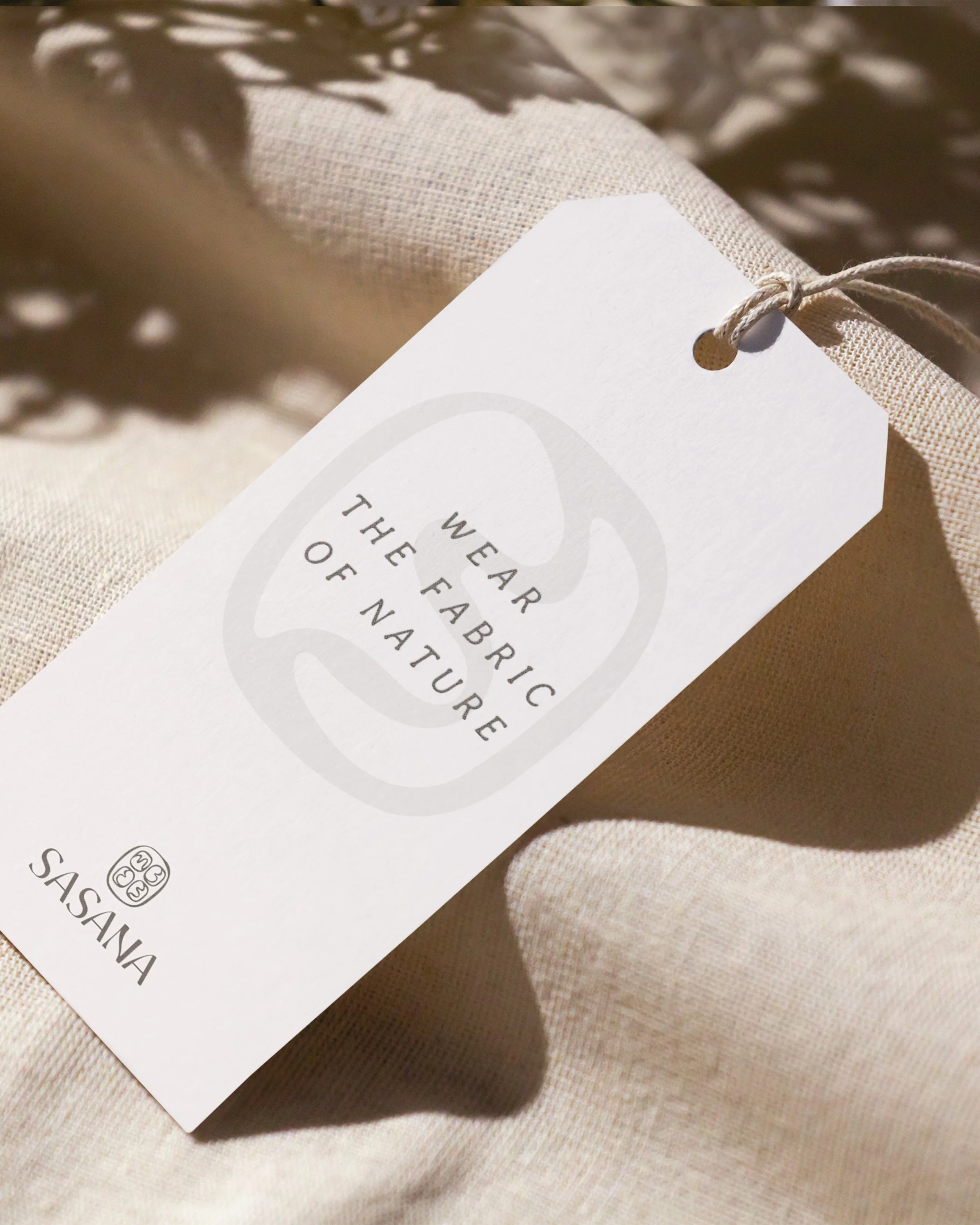 Sustainable clothing brand label design shown on a label mockup