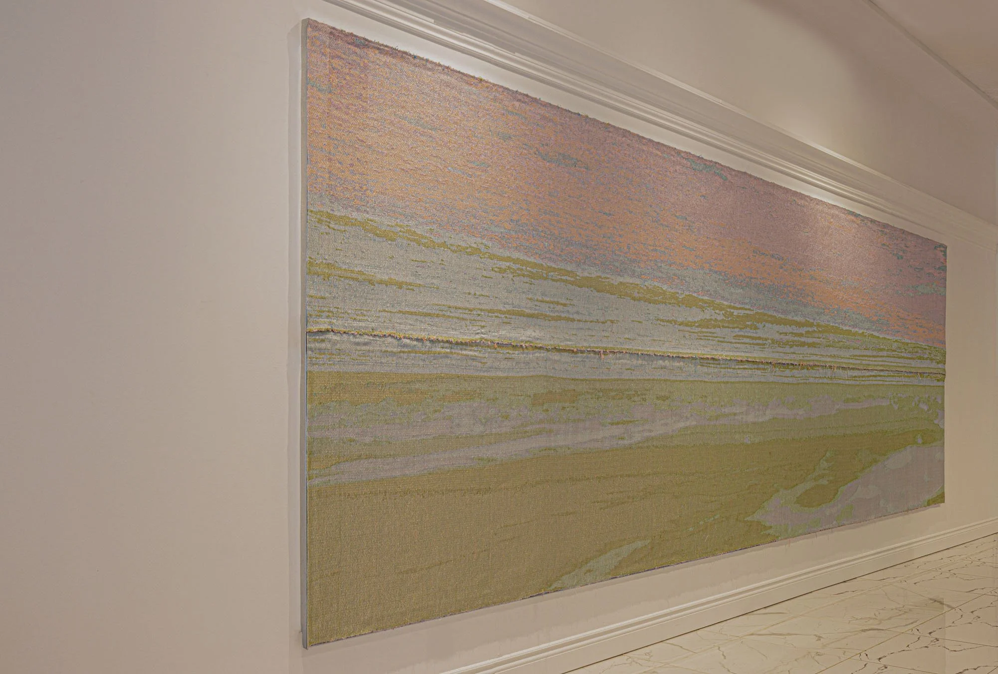 The strength of materiality, the mixing and hovering of threads interlaced from a beach horizon above and the sparkling moss below.