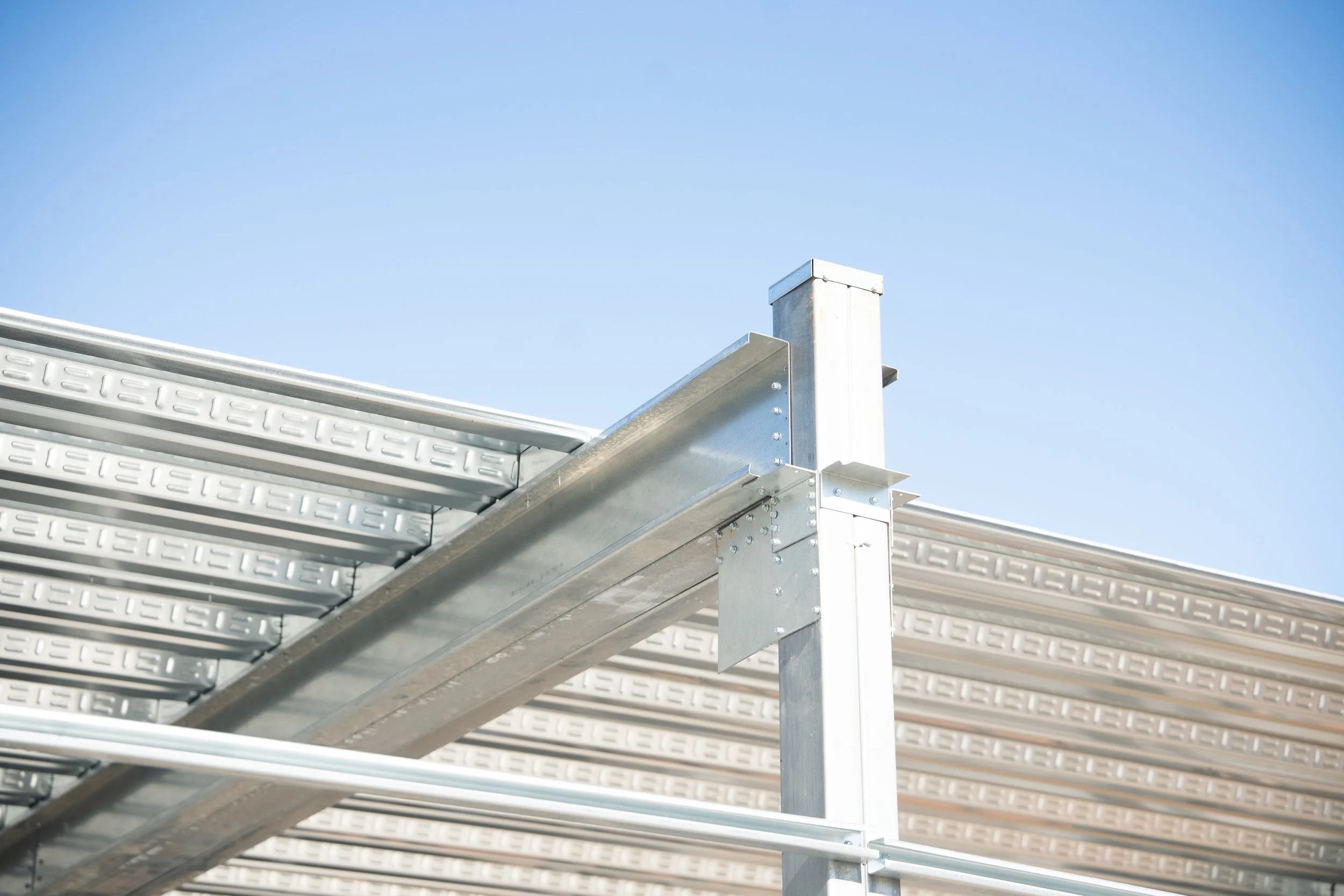 Metal joist connected to metal frame of the storage facility
