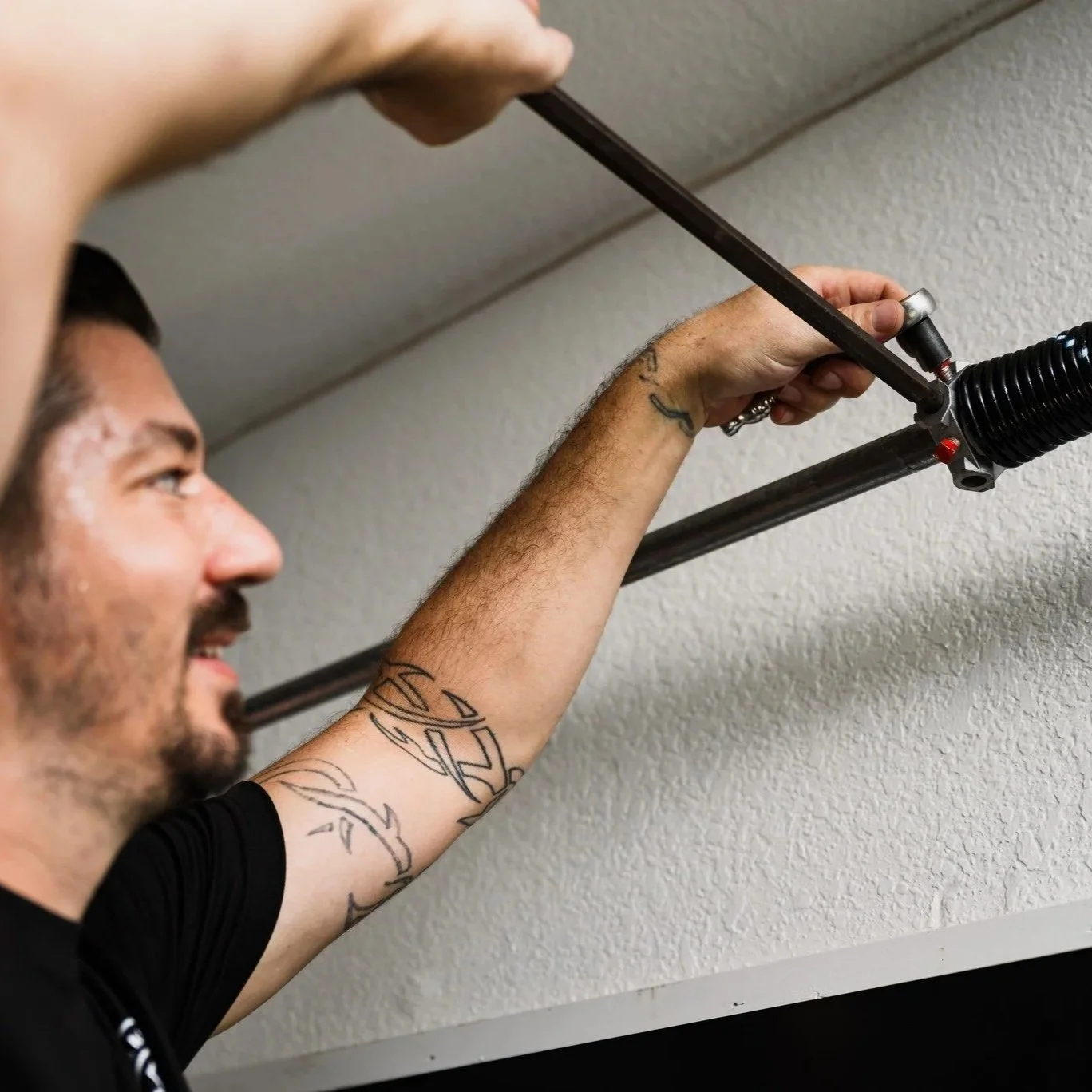 Garage Door Spring Replacement Demystified: Torsion vs. Extension