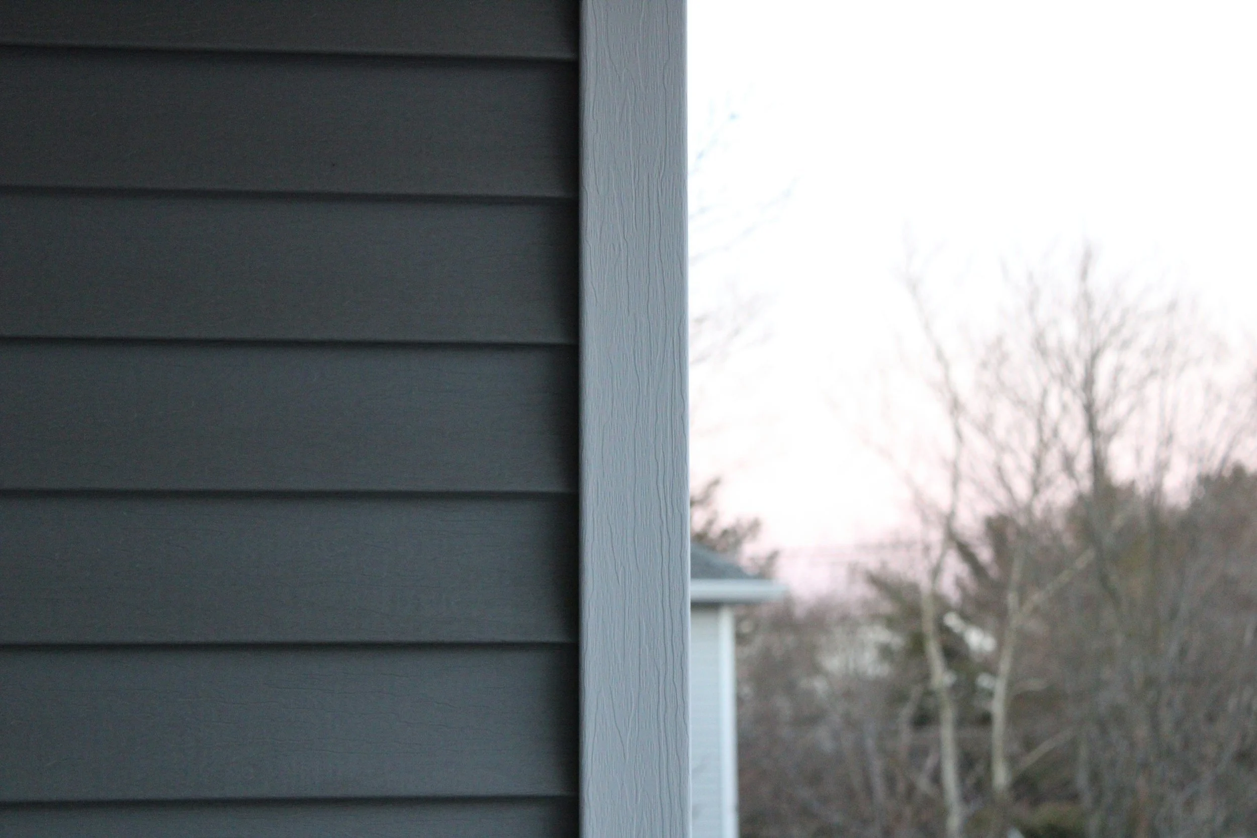 Vinyl vs. Fiber Cement Siding: Which is Best for Your Rhode Island Home?