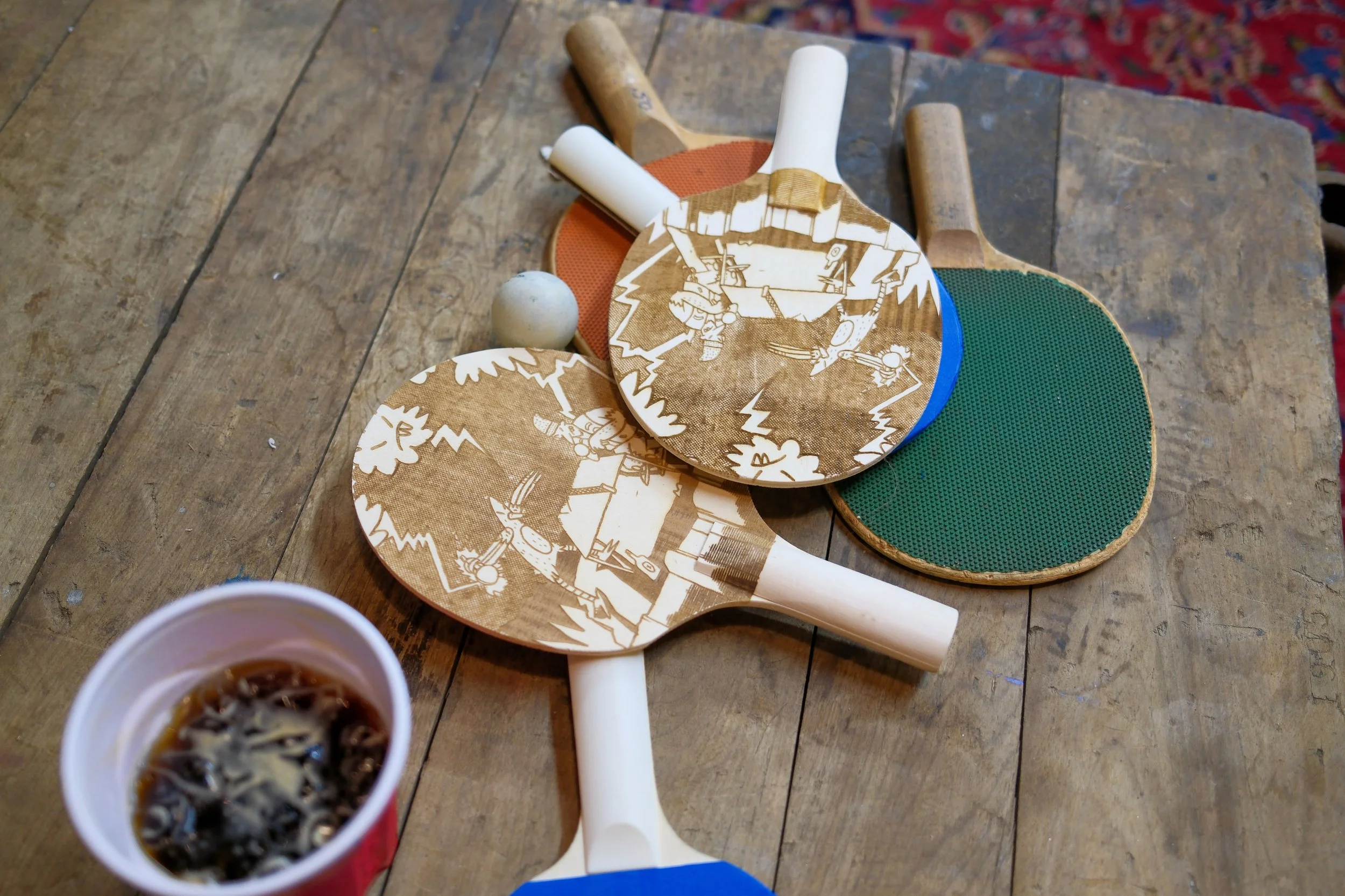 Design laser cut onto paddles.