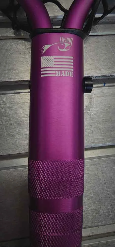 Purple exercise roller with a sticker displaying an American flag and the word "MADE."