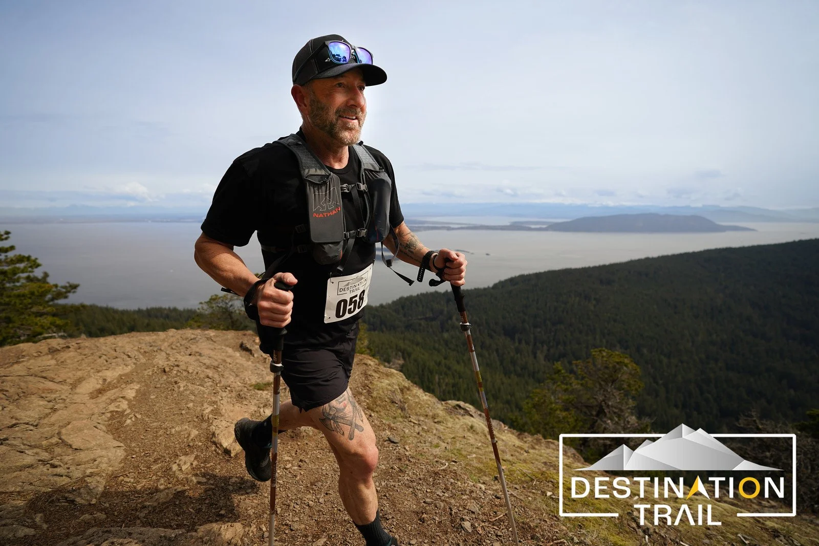 Cameron Hanes running along the cliffs on Orcas Island