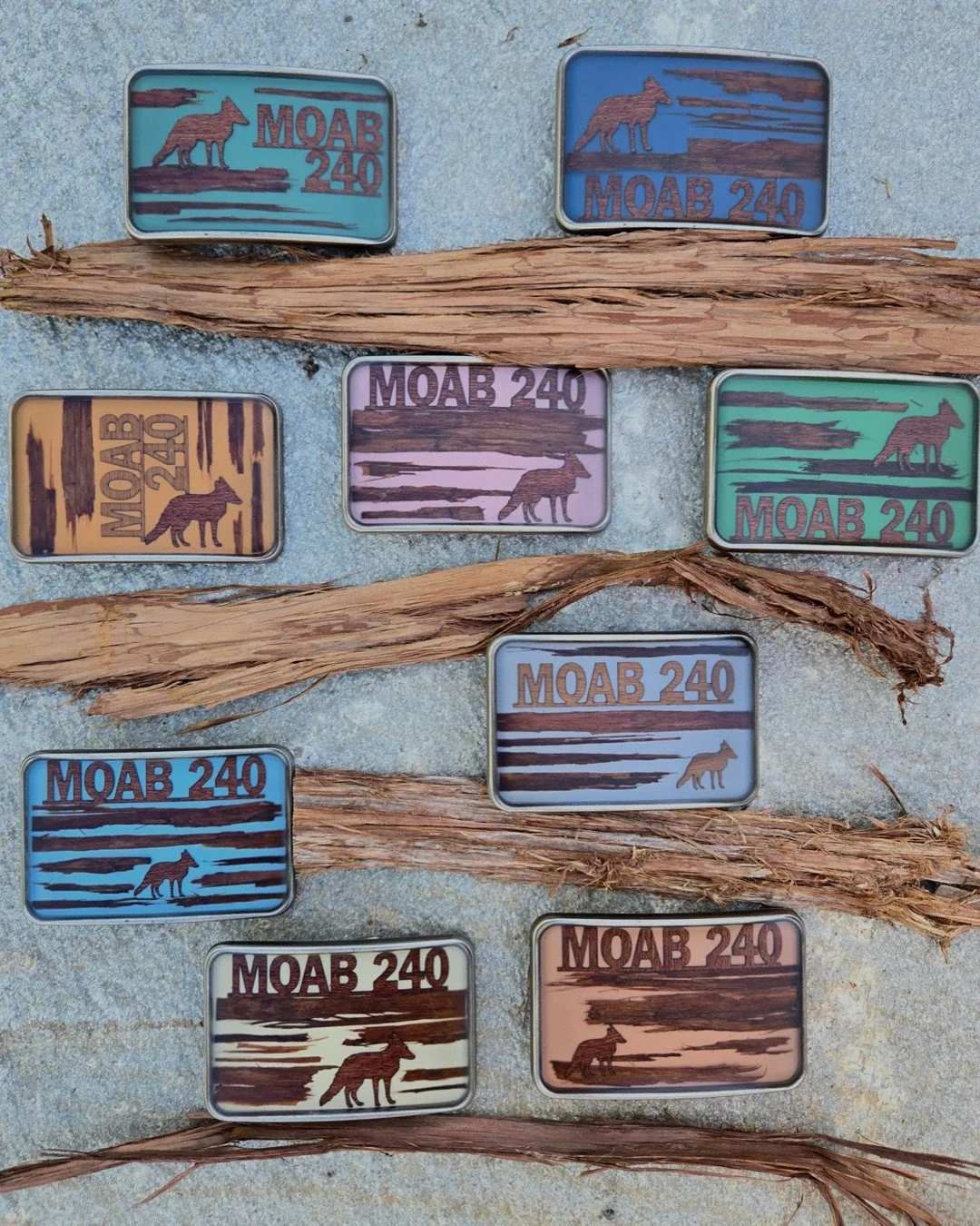 Exciting news: The Moab 240 finisher buckles are ready and waiting for their forever homes! 🤩⁠
⁠
Artist @bykali really outdid herself this time (as she does every race!). Each buckle is unique and made with items you'd find on the course.⁠
⁠
Oh, and