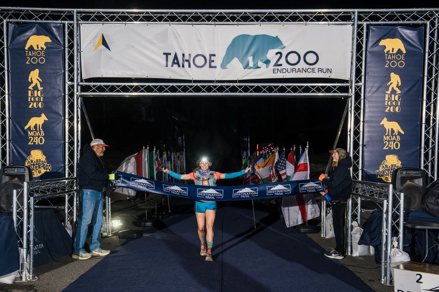 Annie Hughes crossing the finish line at the Tahoe 200
