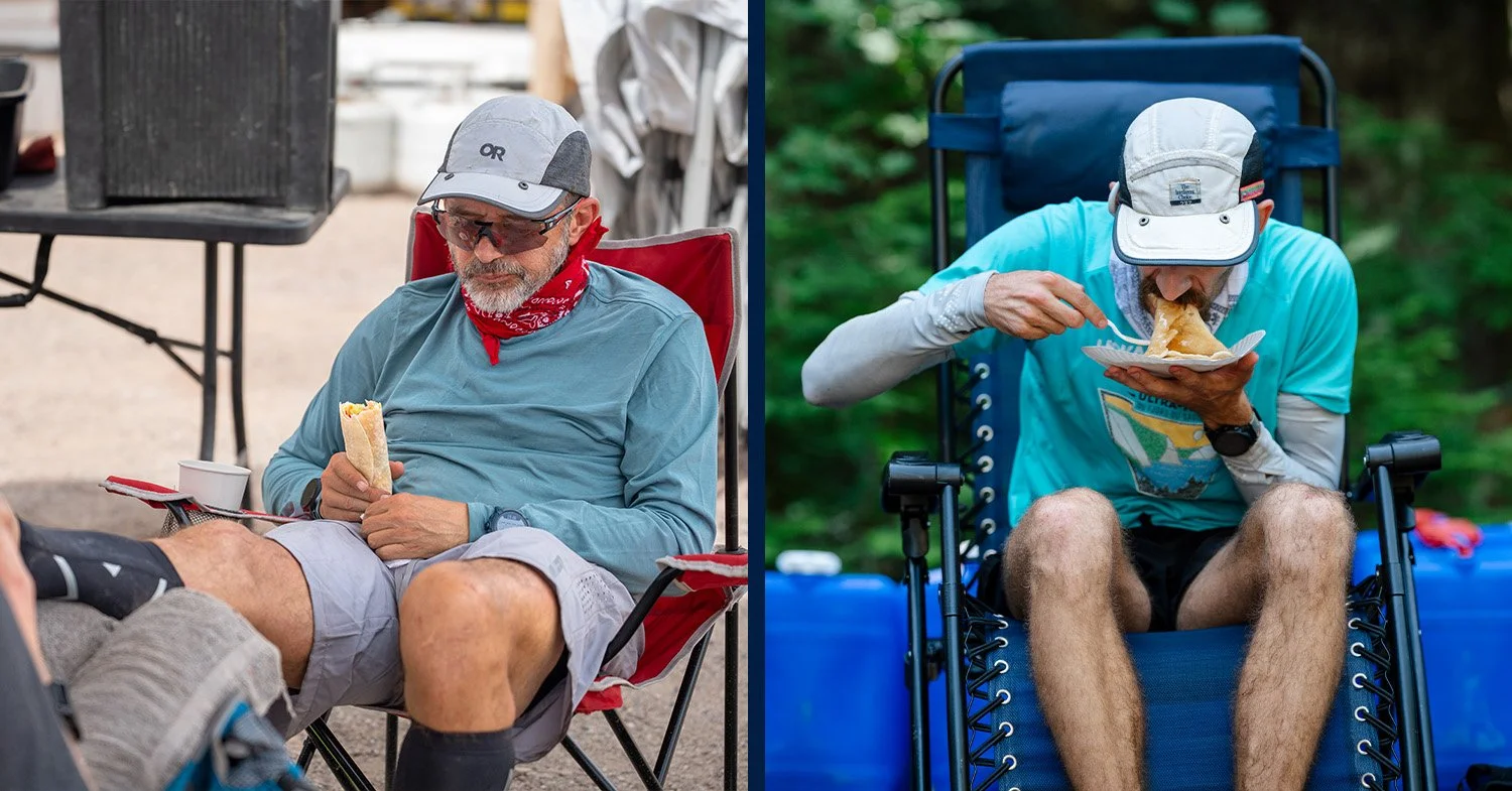 Two ultramarathon runners rest and eat at aid stations