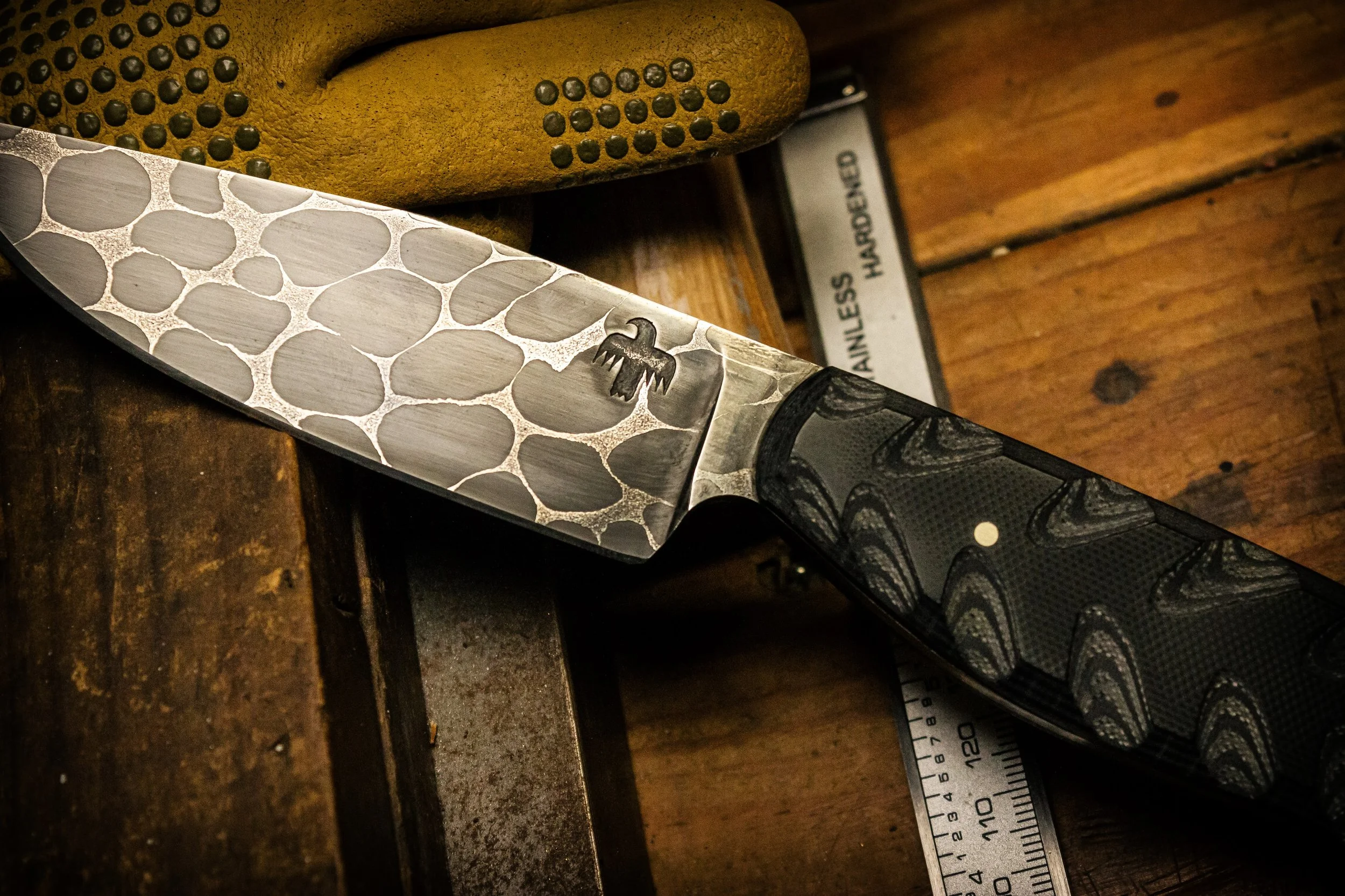 Ball bearing Damascus hunter made by M Wheeler.