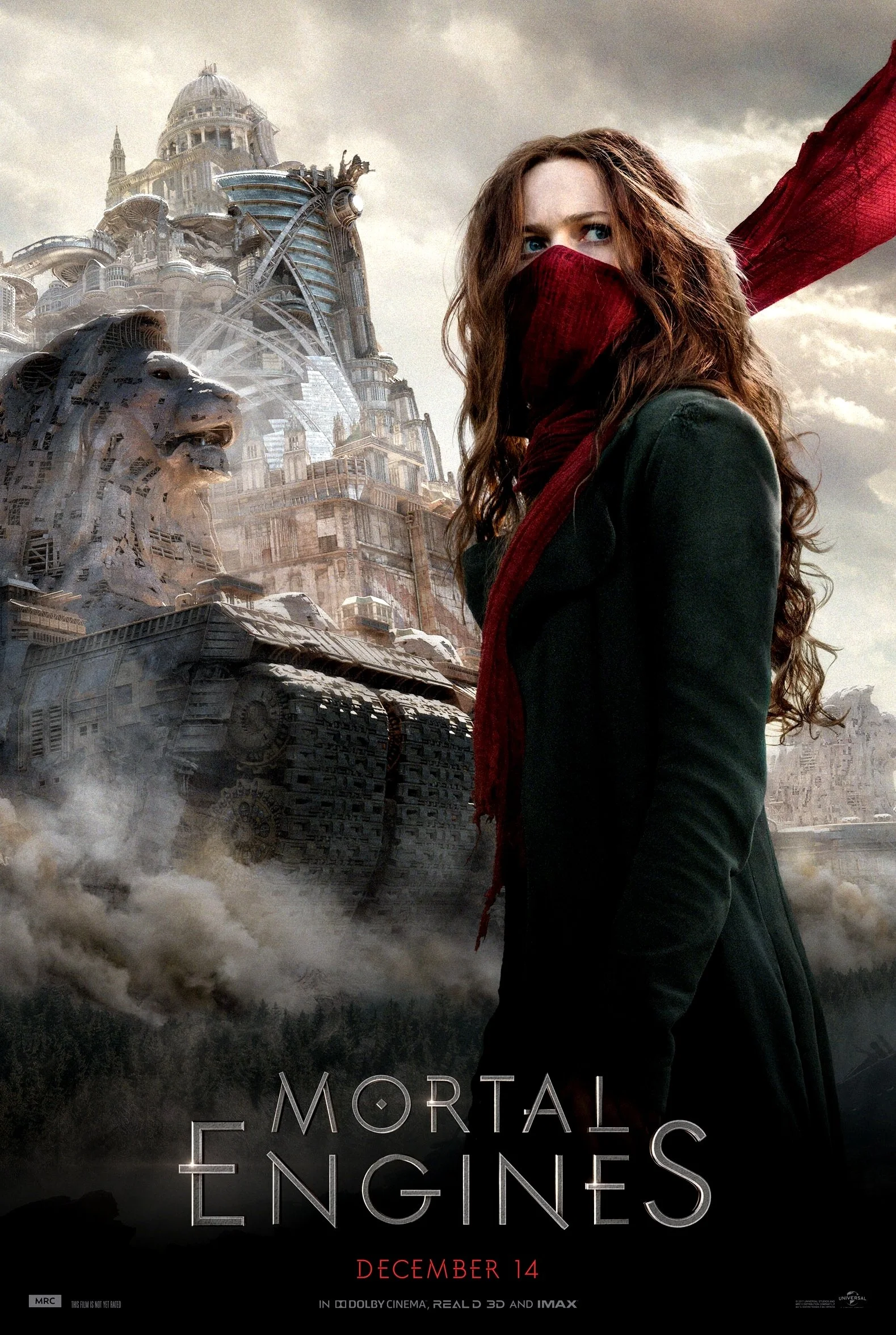 A female character wearing a red scarf and face covering, with long, curly hair, standing in front of a dystopian cityscape with a large tank and a lion monument, promoting the movie "Mortal Engines" scheduled for December 14.