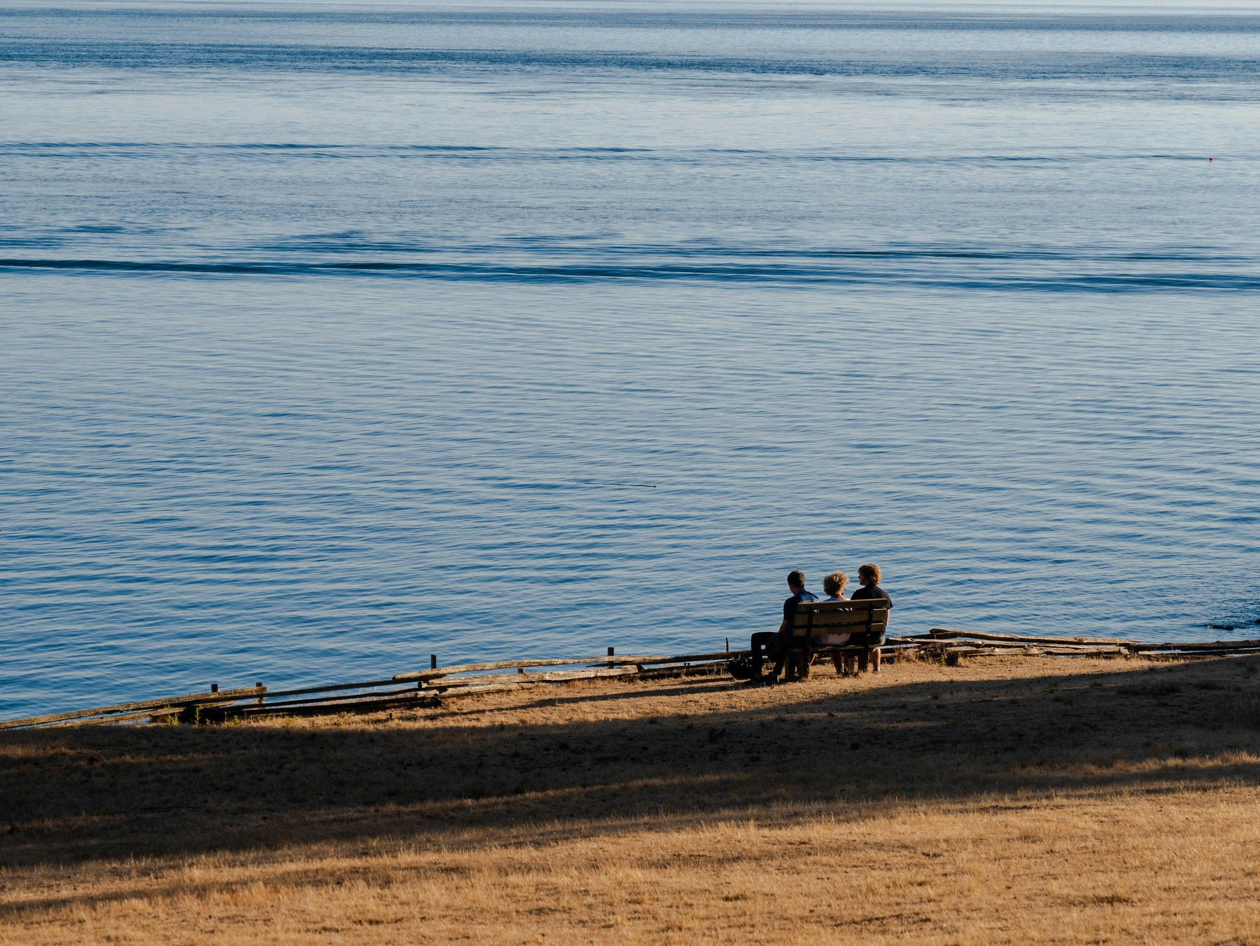 Person reflecting quietly near water