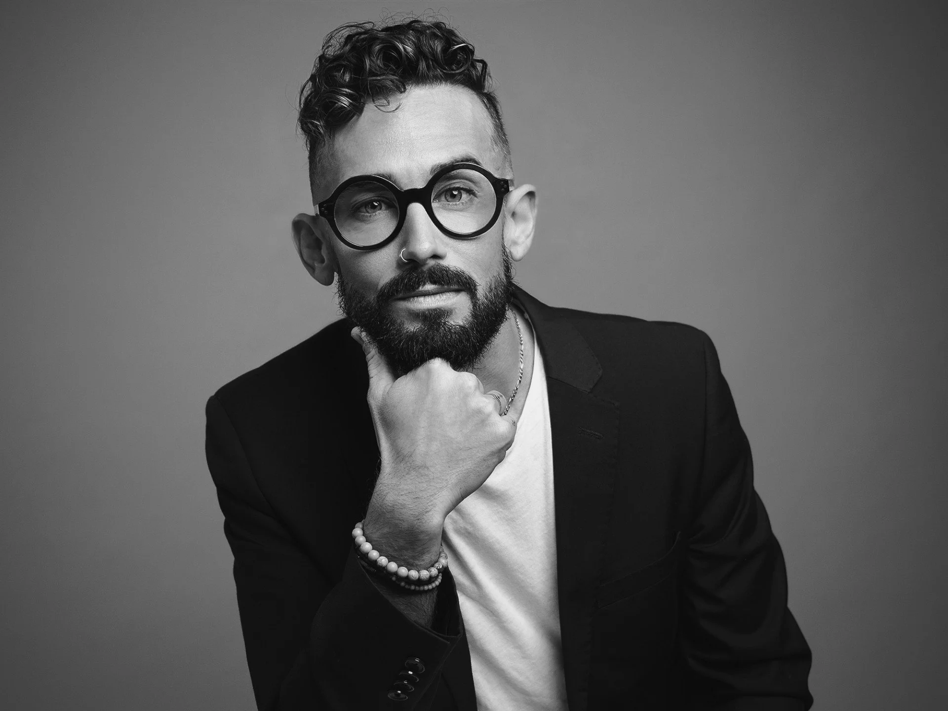 aaron endre poses for a headshot