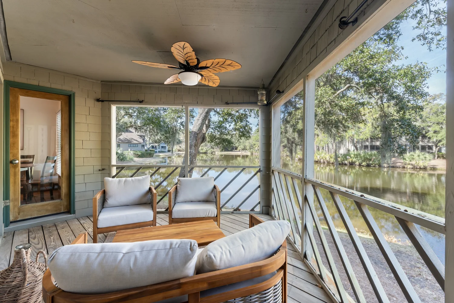 Screened porch overlooking the lagoon at sunset