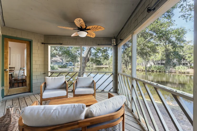 Porch seating area overlooking lagoon