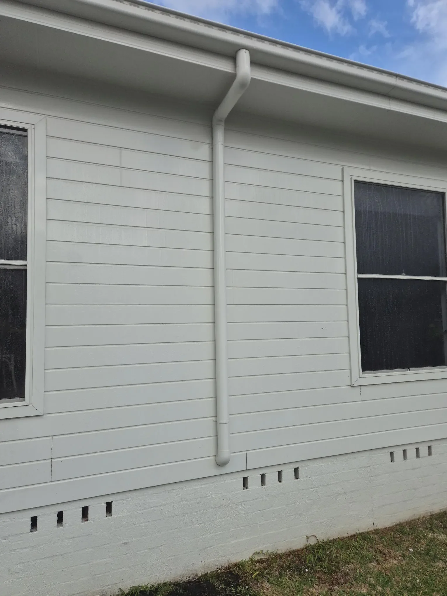 Shaunos cleans house exterior