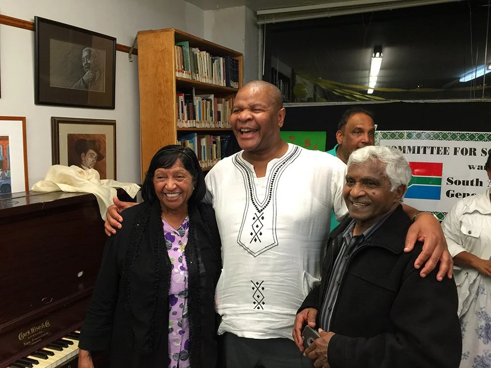 Former South Africa Consul General Cyril Ndaba (center) with COSAS members Sue and Sam Moonsamy.