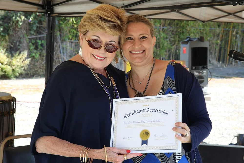 COSAS Operations Manager Nicole Richards presents certificate of appreciation to Rotary Club of Berkeley member and past president Mary Alice Rathbun at COSAS' Anniversary Dinner.