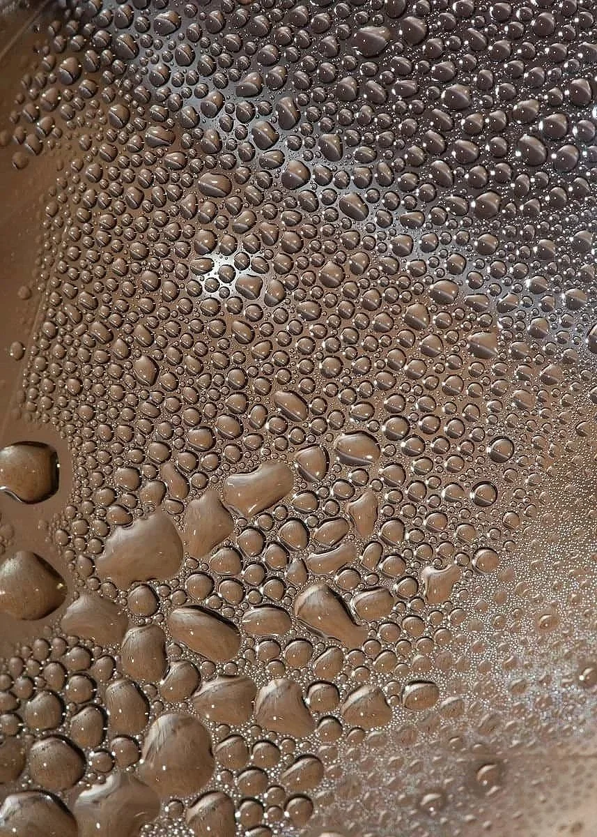 Feng Shui water element represented through reflective mirror texture, symbolizing flow, intuition, and clarity.