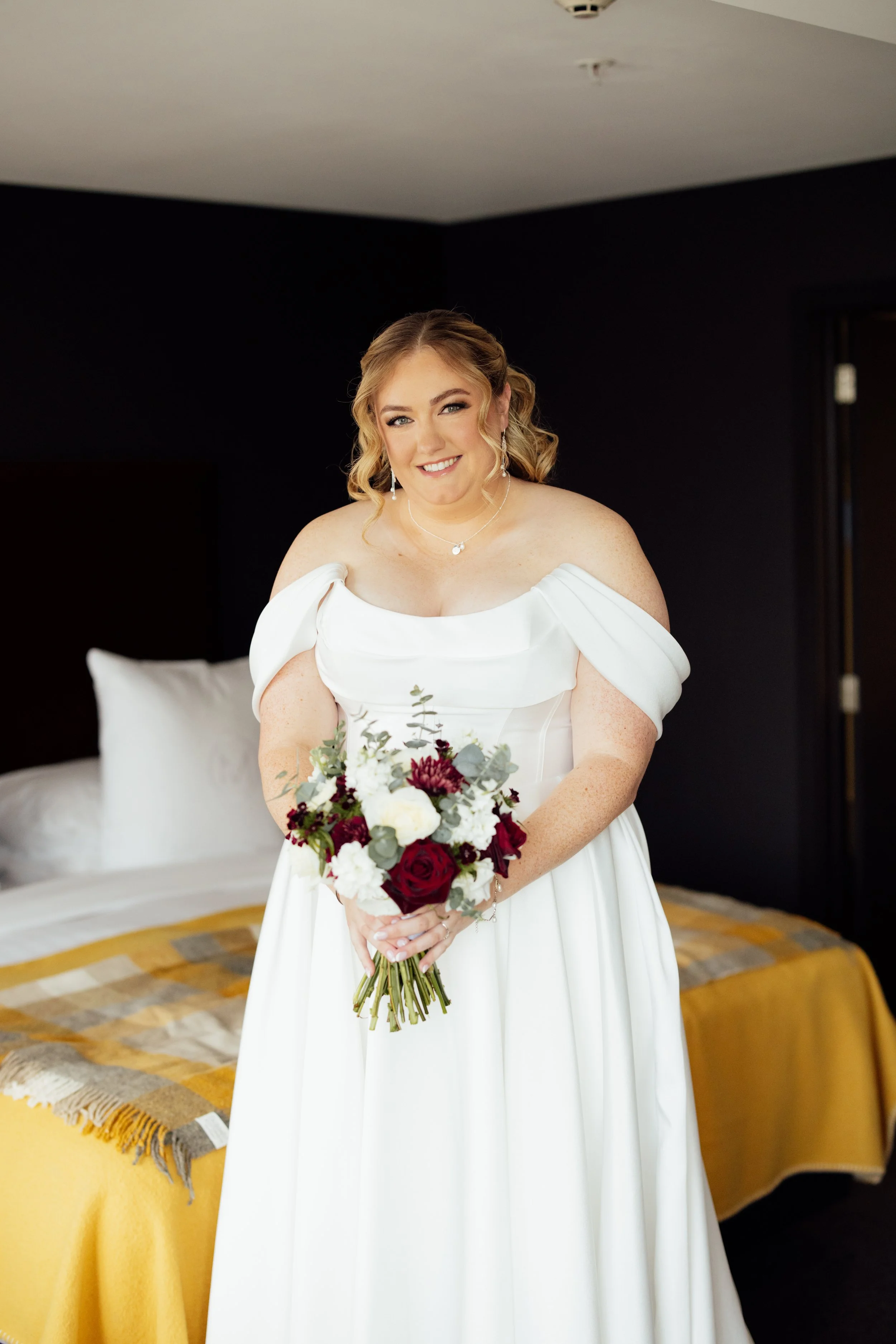 Bride wearing timeless soft glam bridal makeup by Rita Jacinto, Bridal Makeup Artist in Portugal, holding her wedding bouquet with radiant skin and elegant bridal beauty.