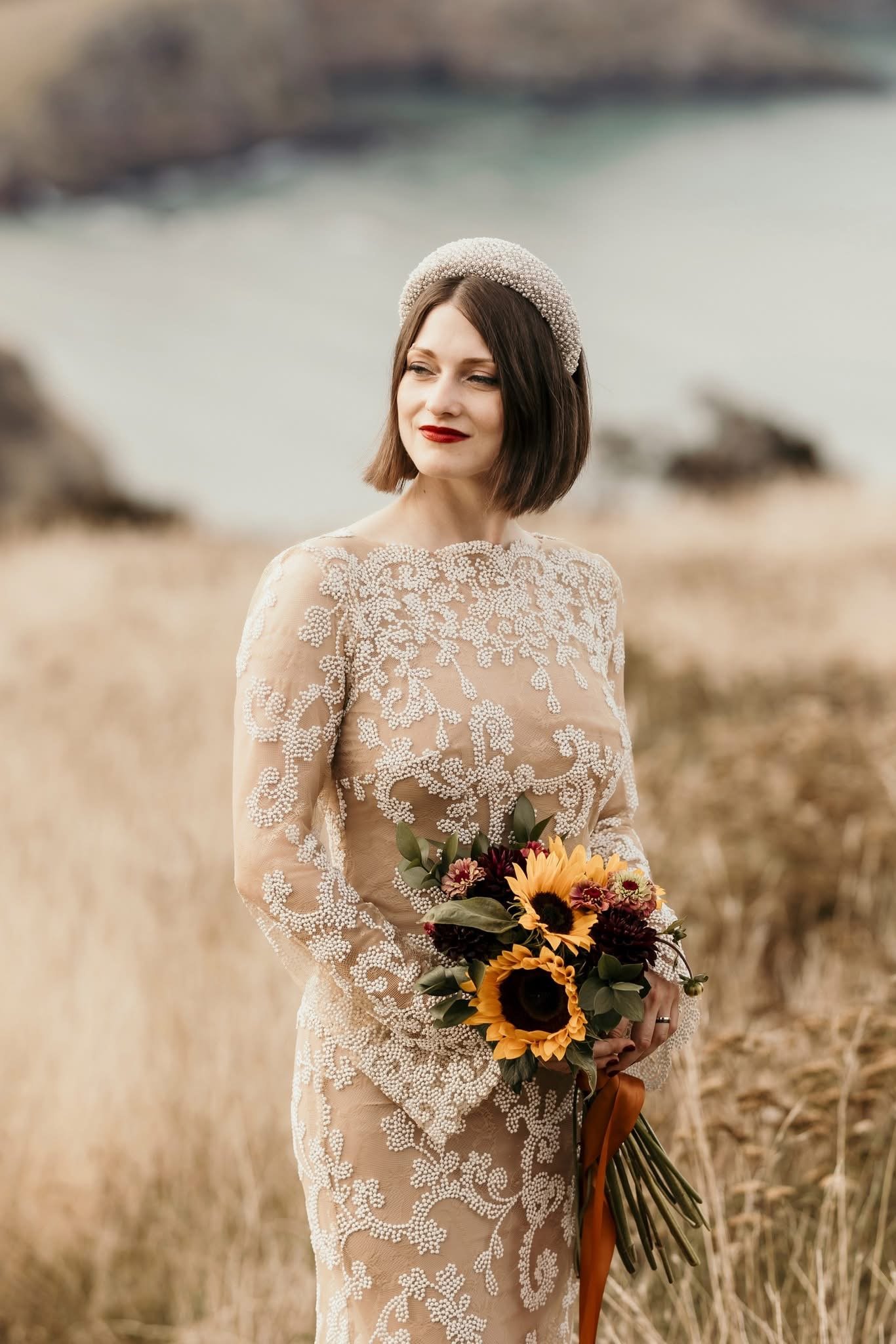 Radiant bridal makeup by Rita Jacinto featuring a classic red lip and soft glam aesthetic for a destination wedding in Portugal.