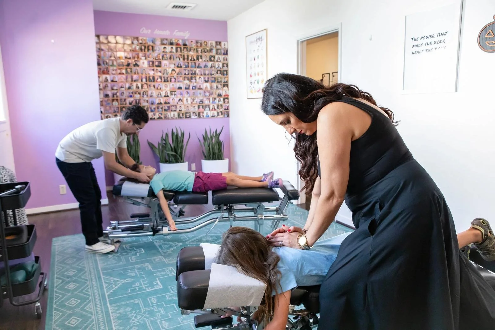Innate Family Chiropractic Pasadena CA — multiple family members receiving simultaneous adjustments in the treatment room.