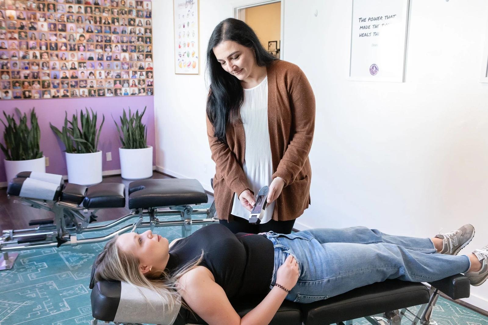 Dr. Adana Vargas of Innate Family Chiropractic Pasadena CA using INSiGHT scanning technology with a pregnant patient.