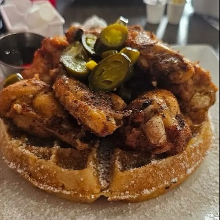 Hot Chick on Top 
Fluffy cinnamon waffle with seasoned wings, jalape&ntilde;os and house hot honey maple 🍁 
🥂Pair it with bottomless mimosas 
#fallvibes🍁