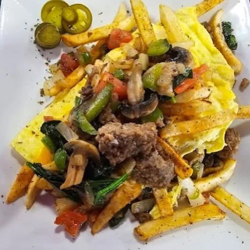 The GODZILLA Omelette 
This is for the big appetite bit&amp;$es who want it all! 
🥚🥚🥚🧅🍅🫑🧀🥔
Massive fluffy omelette loaded with sausage, bacon, American &amp; Swiss cheese, green peppers, tomato, onion, mushroom and did we mention it comes wit