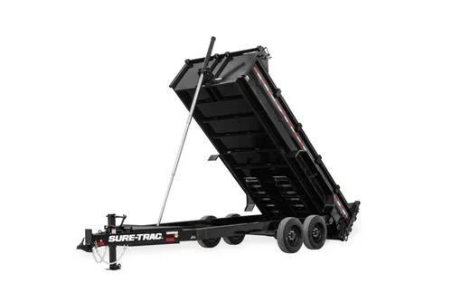 A black Sure-Trac tandem axle dump trailer with a raised bed for hauling and dumping materials.