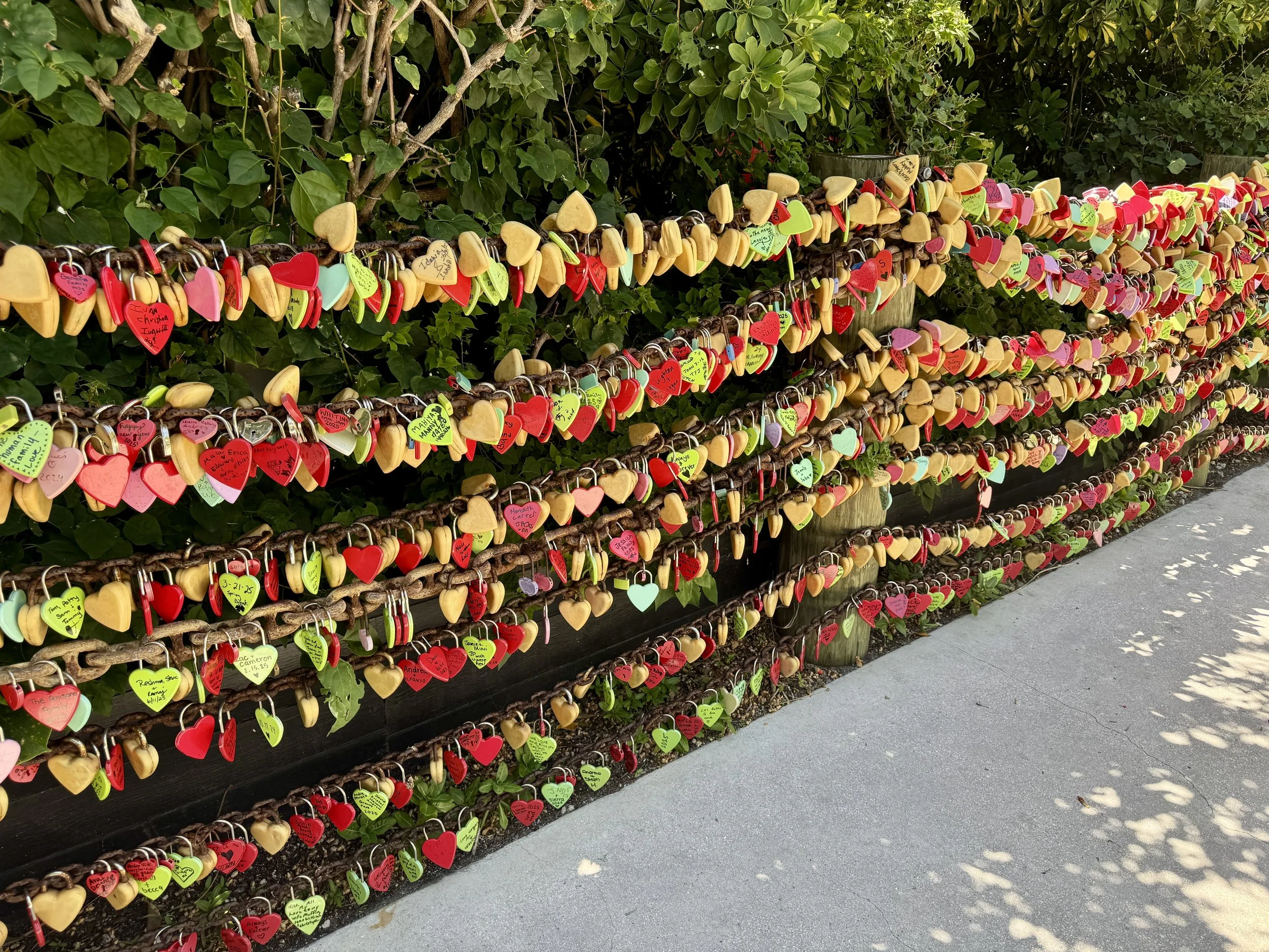 Colorful love lock wall at Blond giraffe key lime pie factory in Tavernier Florida