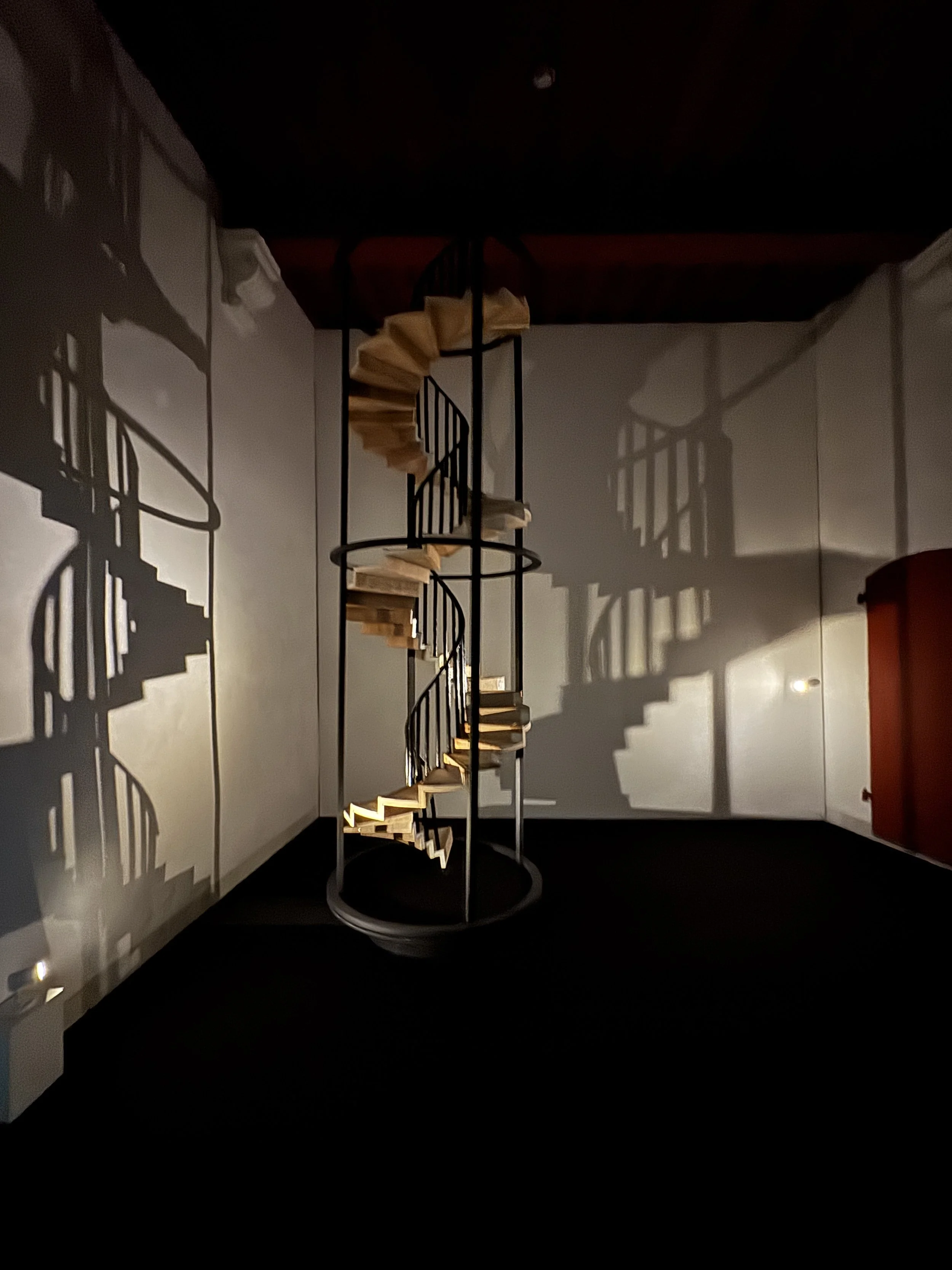 Modern spiral staircase installation inside Oude Kerk contrasting historic interior