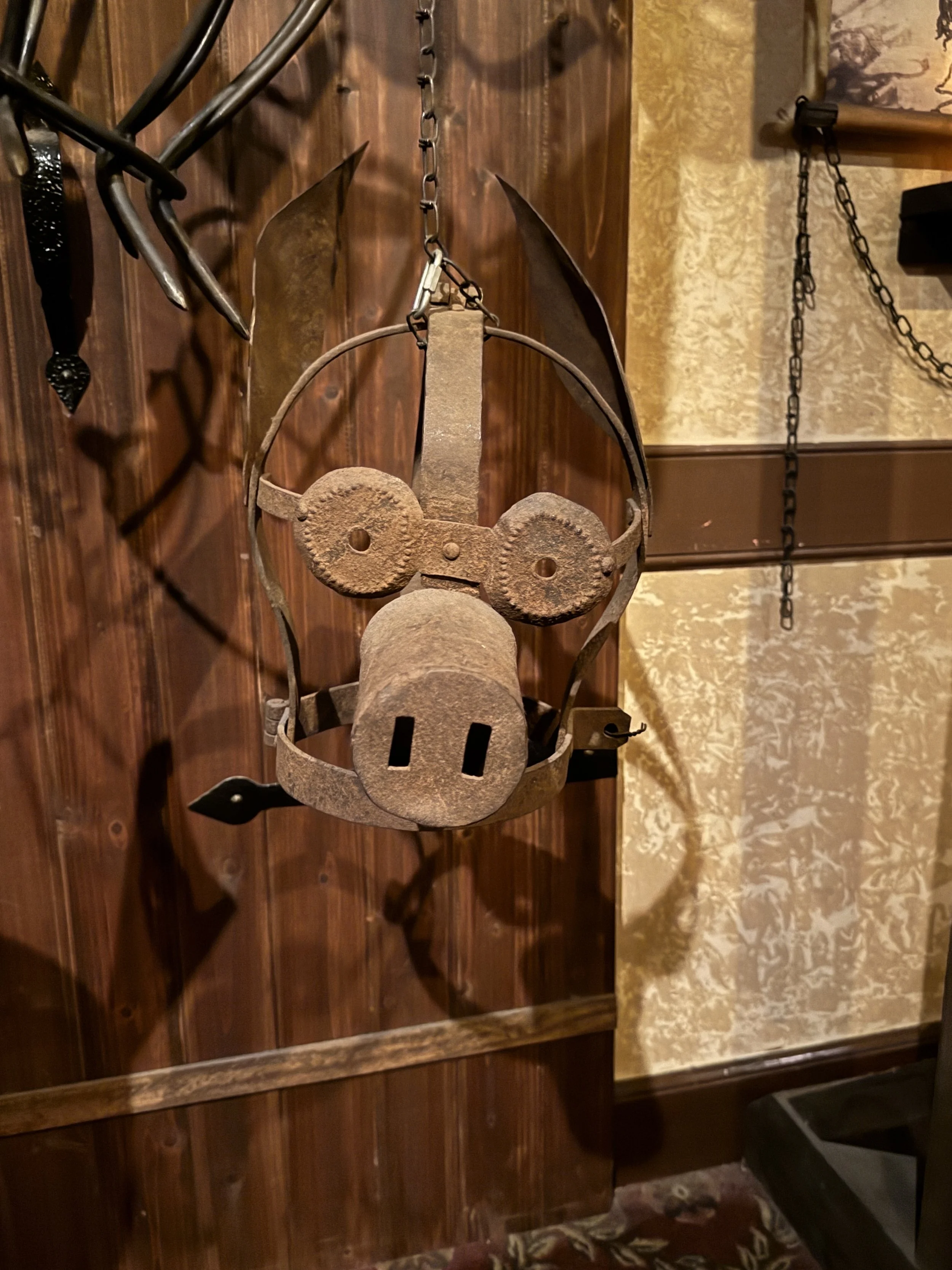 Close-up display of medieval restraint device at the Medieval Torture Museum in St. Augustine.