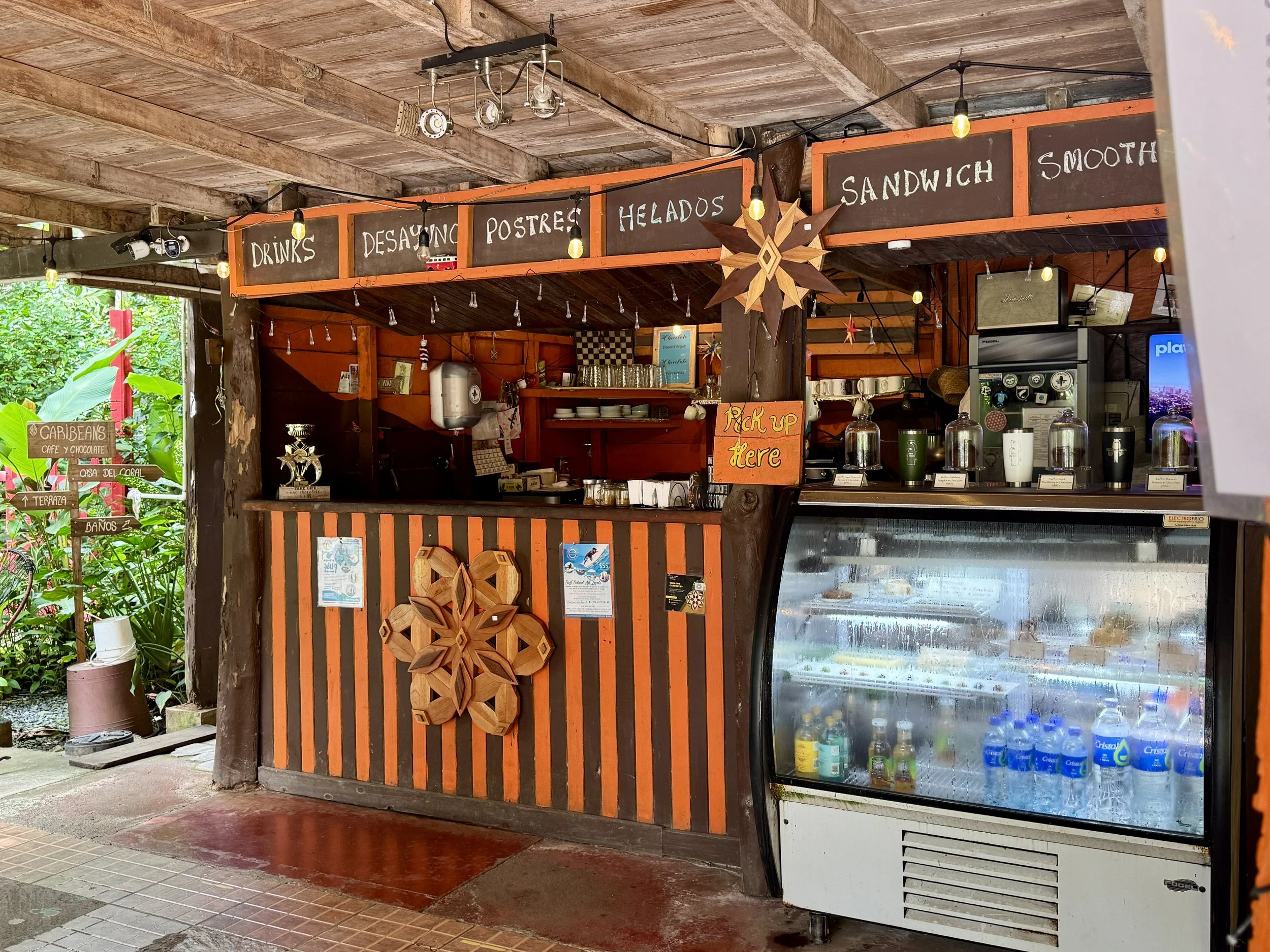 Rustic coffee counter and pastry bar inside Caribeans Chocolate and Coffee.